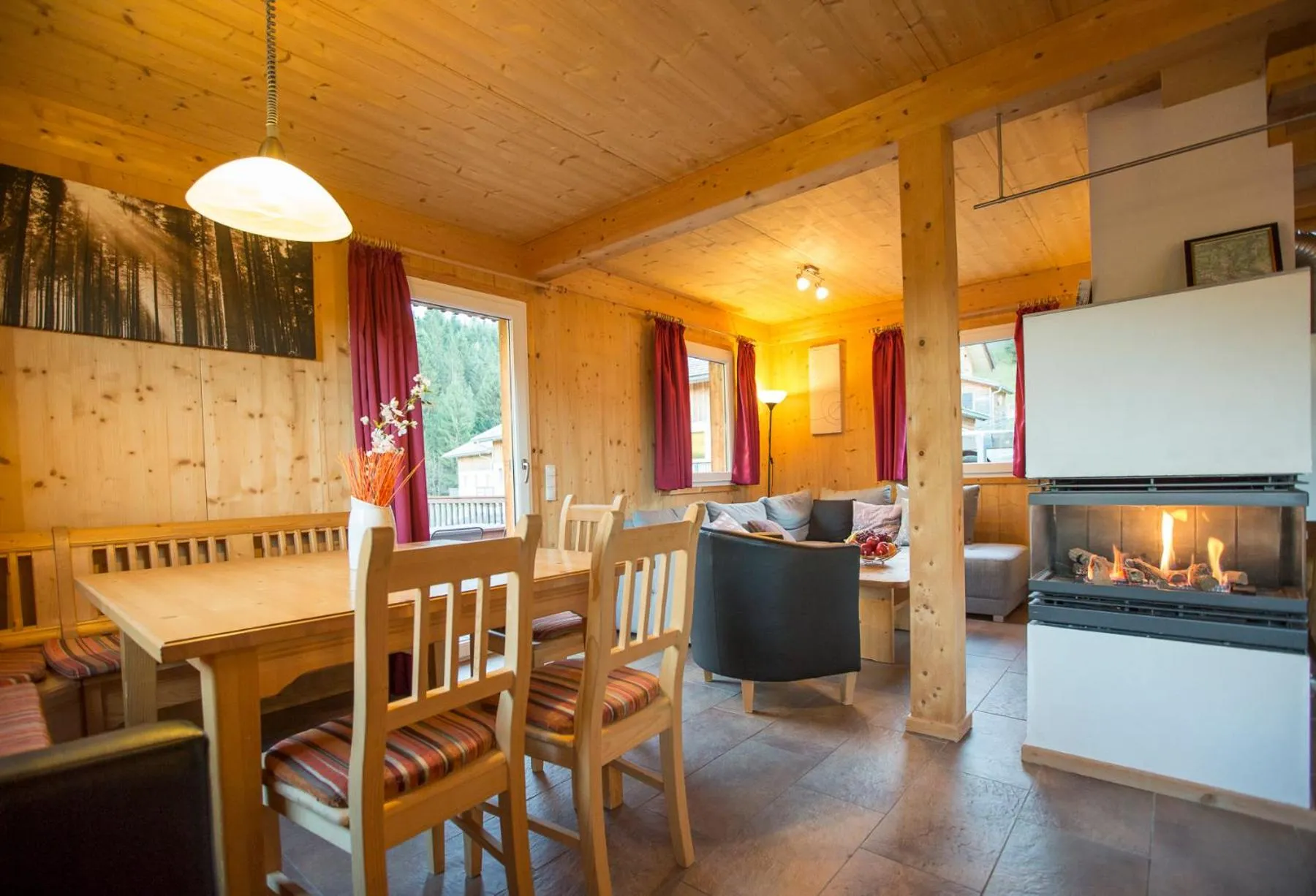 Living room in Alpendorf Dachstein West by ALPS RESORTS