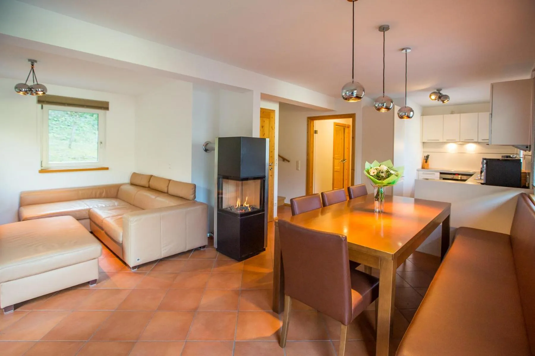 Living room, Bed in Alpendorf Dachstein West by ALPS RESORTS