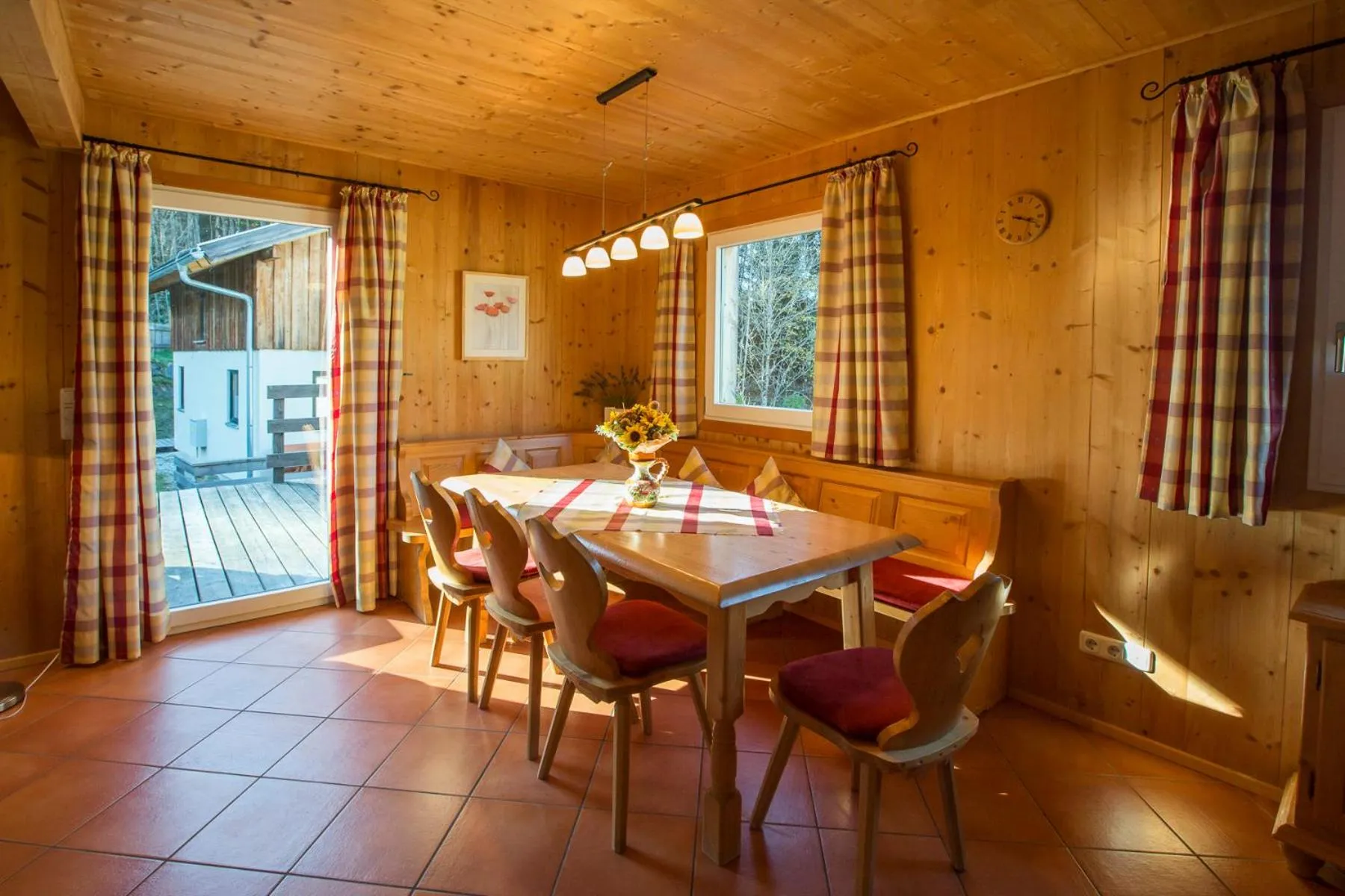 Dining area in Alpendorf Dachstein West by ALPS RESORTS