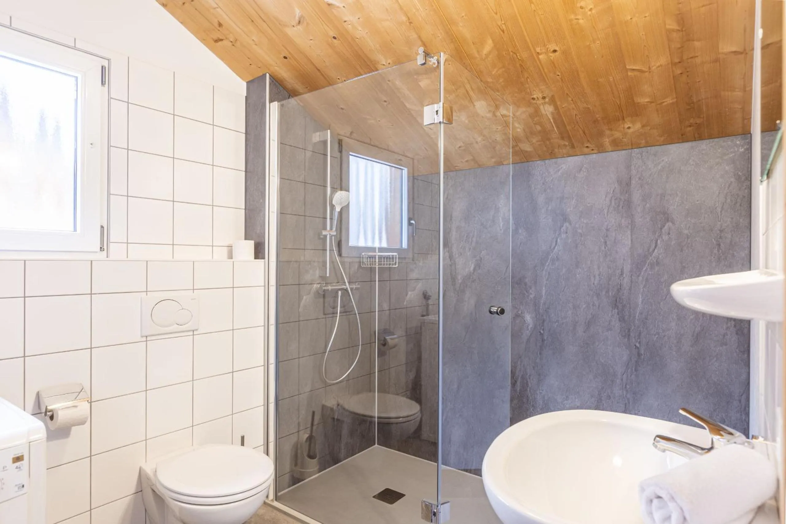 Bathroom in Alpendorf Dachstein West by ALPS RESORTS