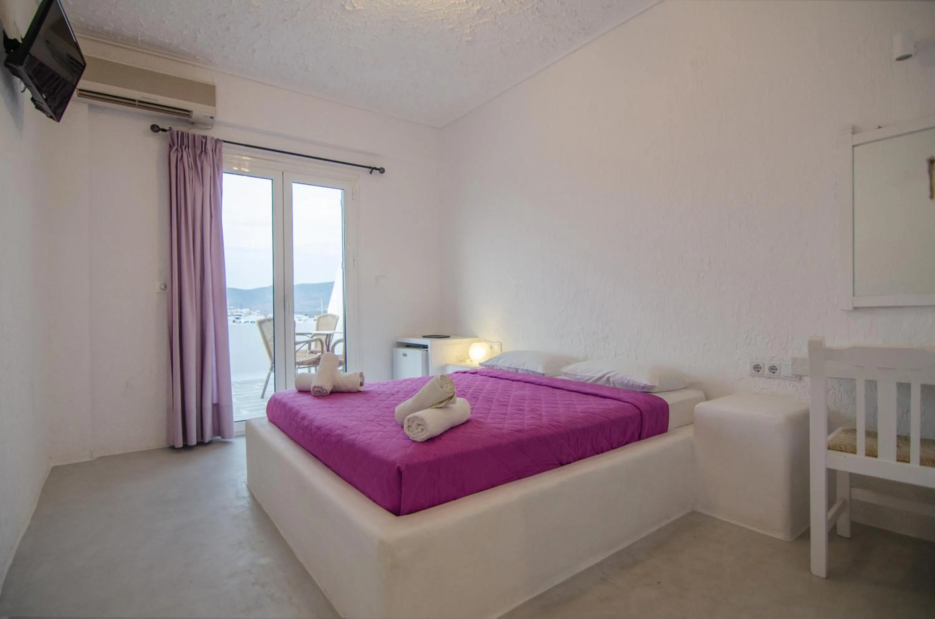 Bed in Sunrise Hotel