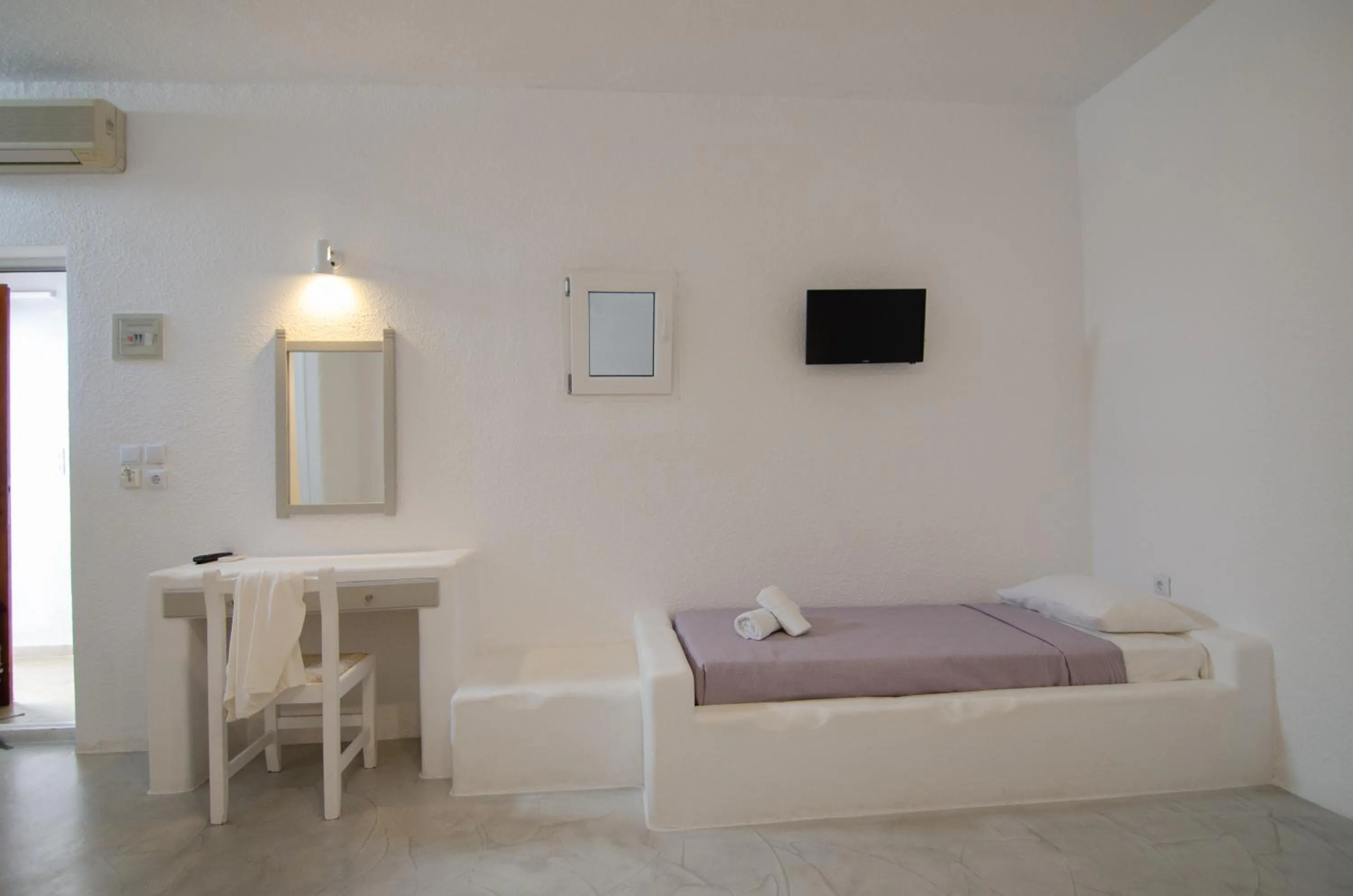 Bed in Sunrise Hotel