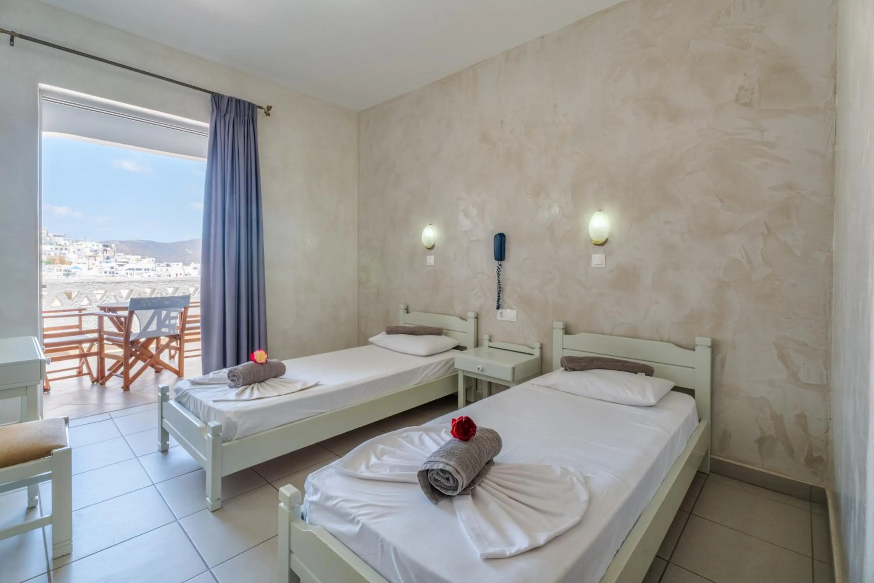 Bed in Sunrise Hotel