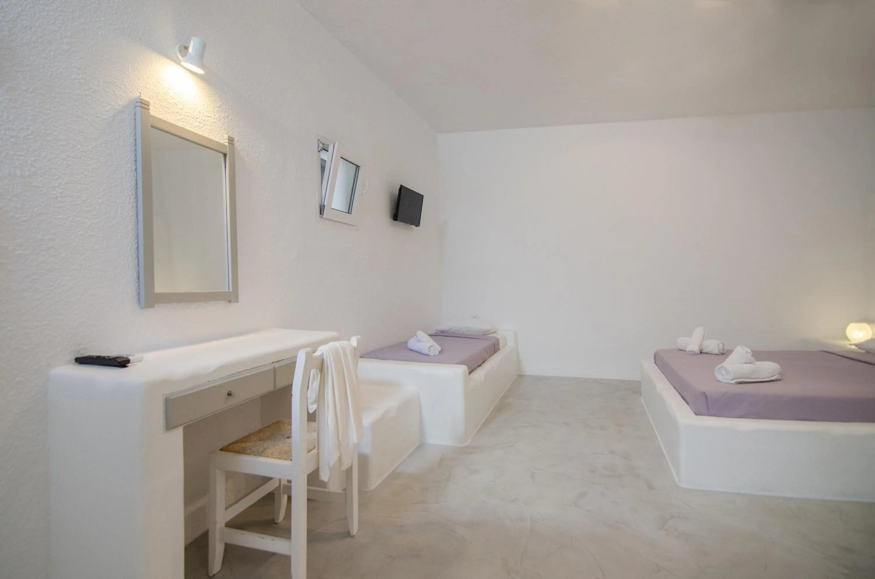 Bed in Sunrise Hotel