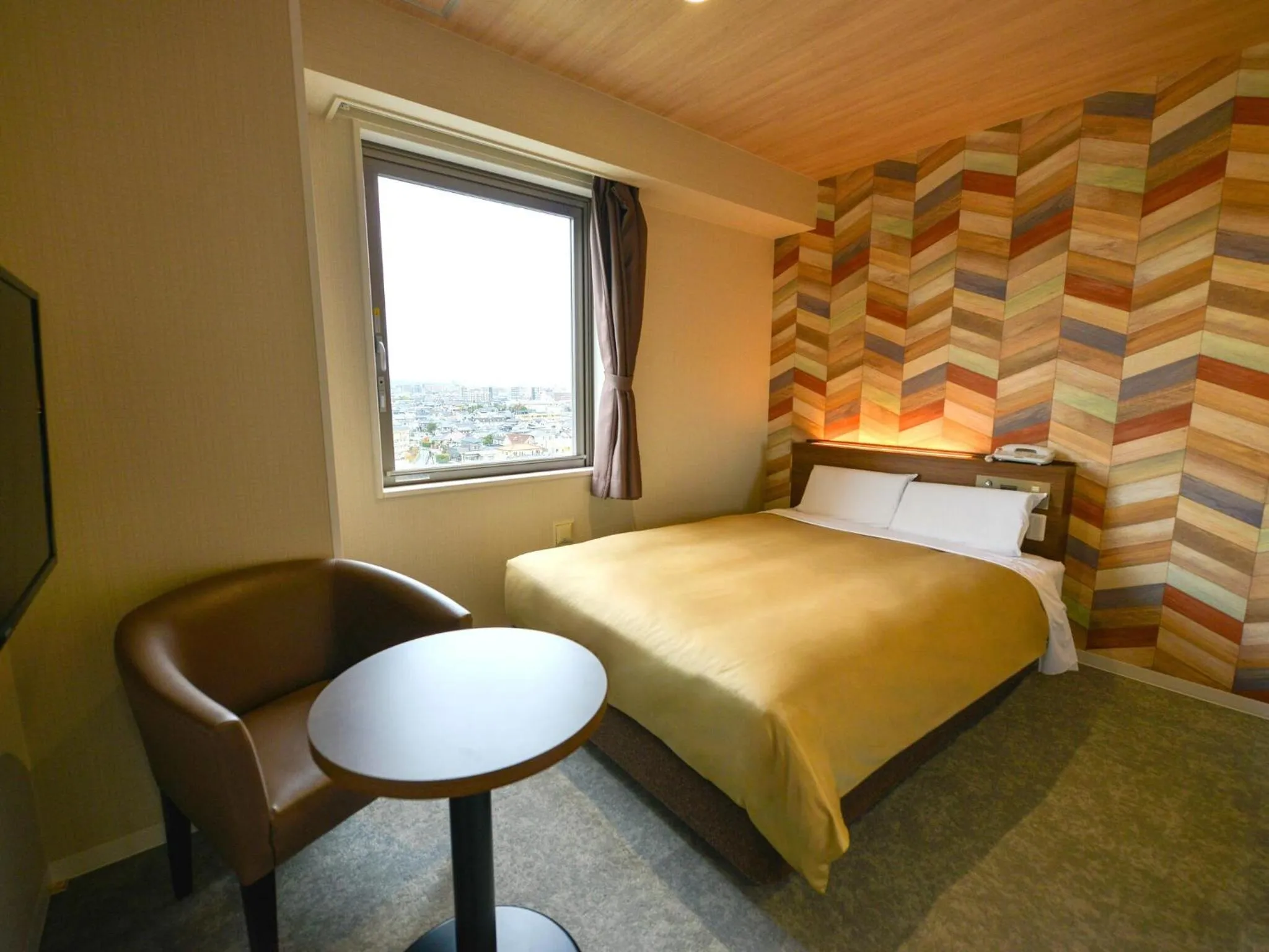 Bed in Hotel New Gaea Nishi Kumamoto Ekimae