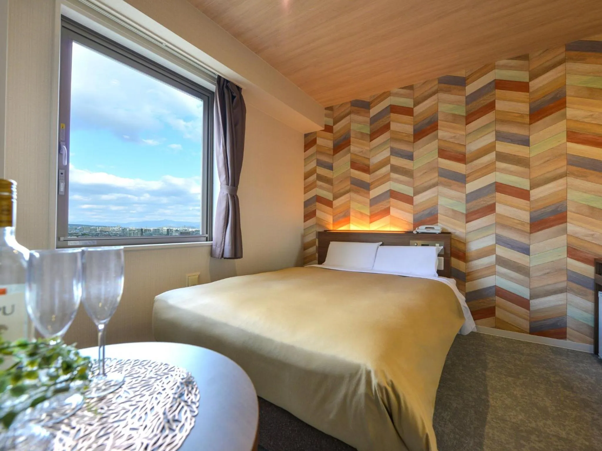 Bed in Hotel New Gaea Nishi Kumamoto Ekimae