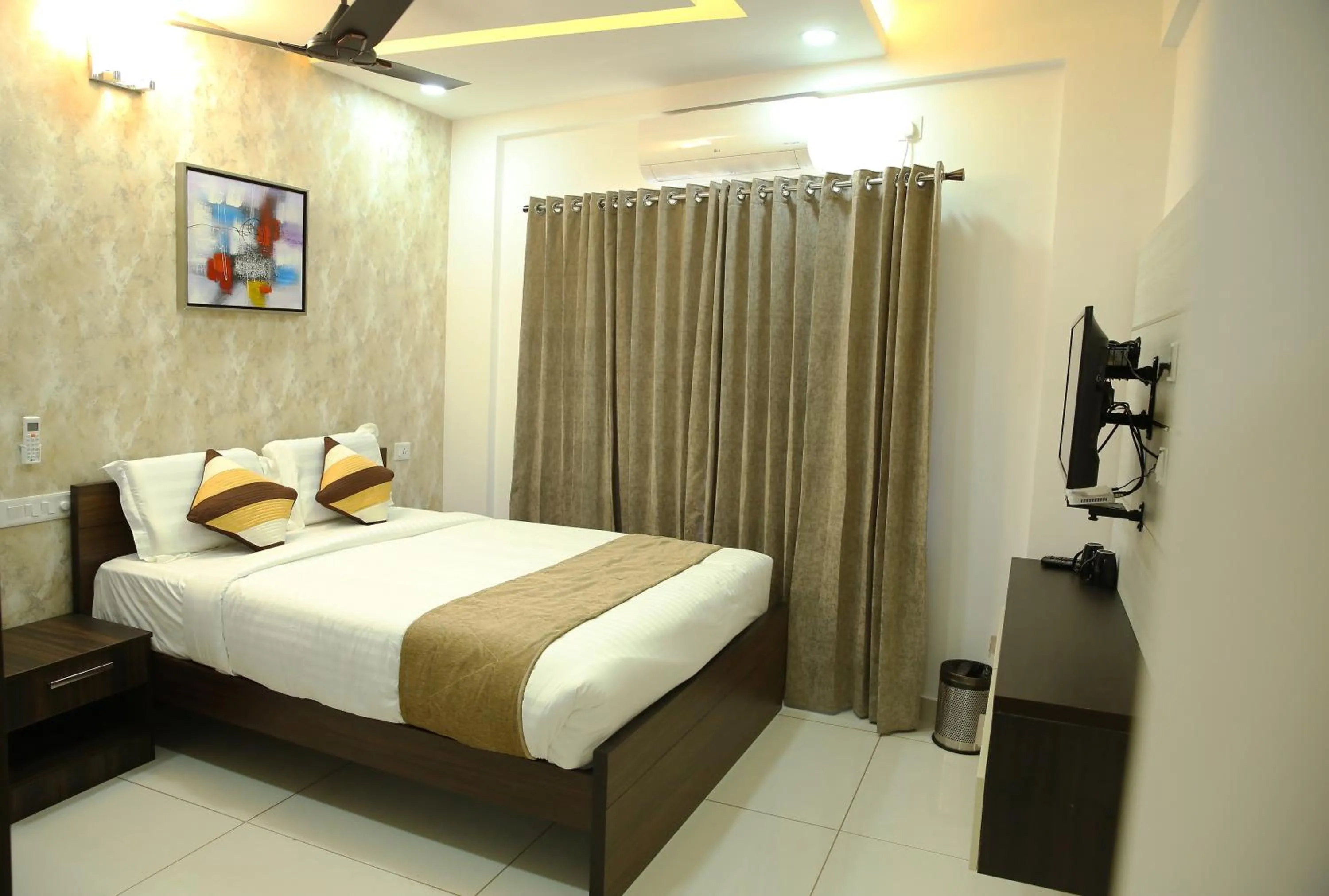 Bed in Eden Isle Luxury Service Apartment