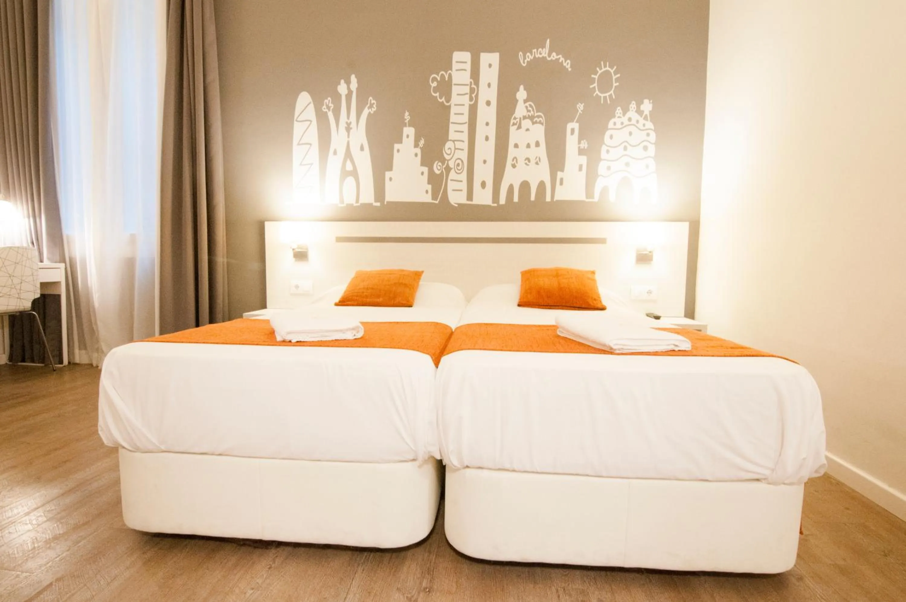 Bed in Hostal Live Barcelona