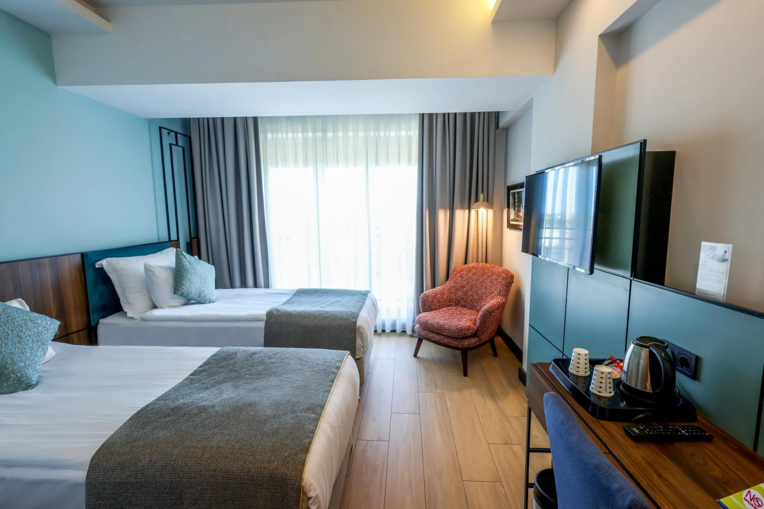 Bed in Leaf Port Hotel