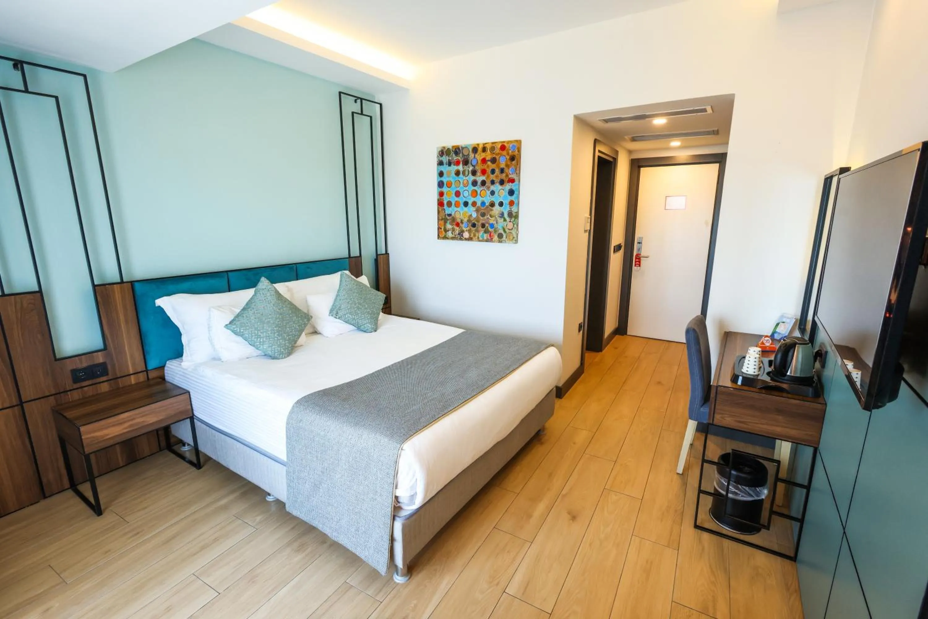 Bed in Leaf Port Hotel