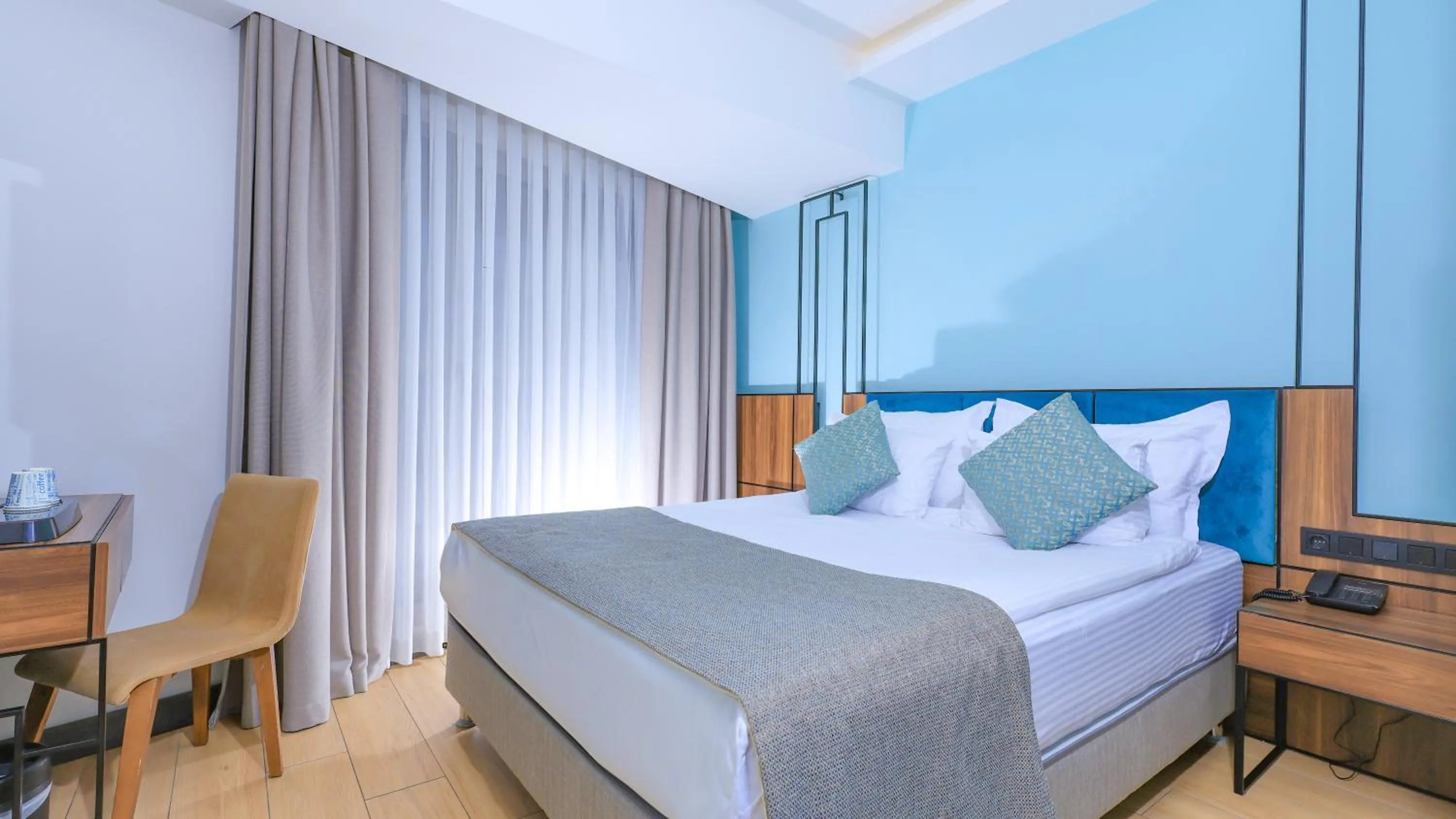 Bed in Leaf Port Hotel