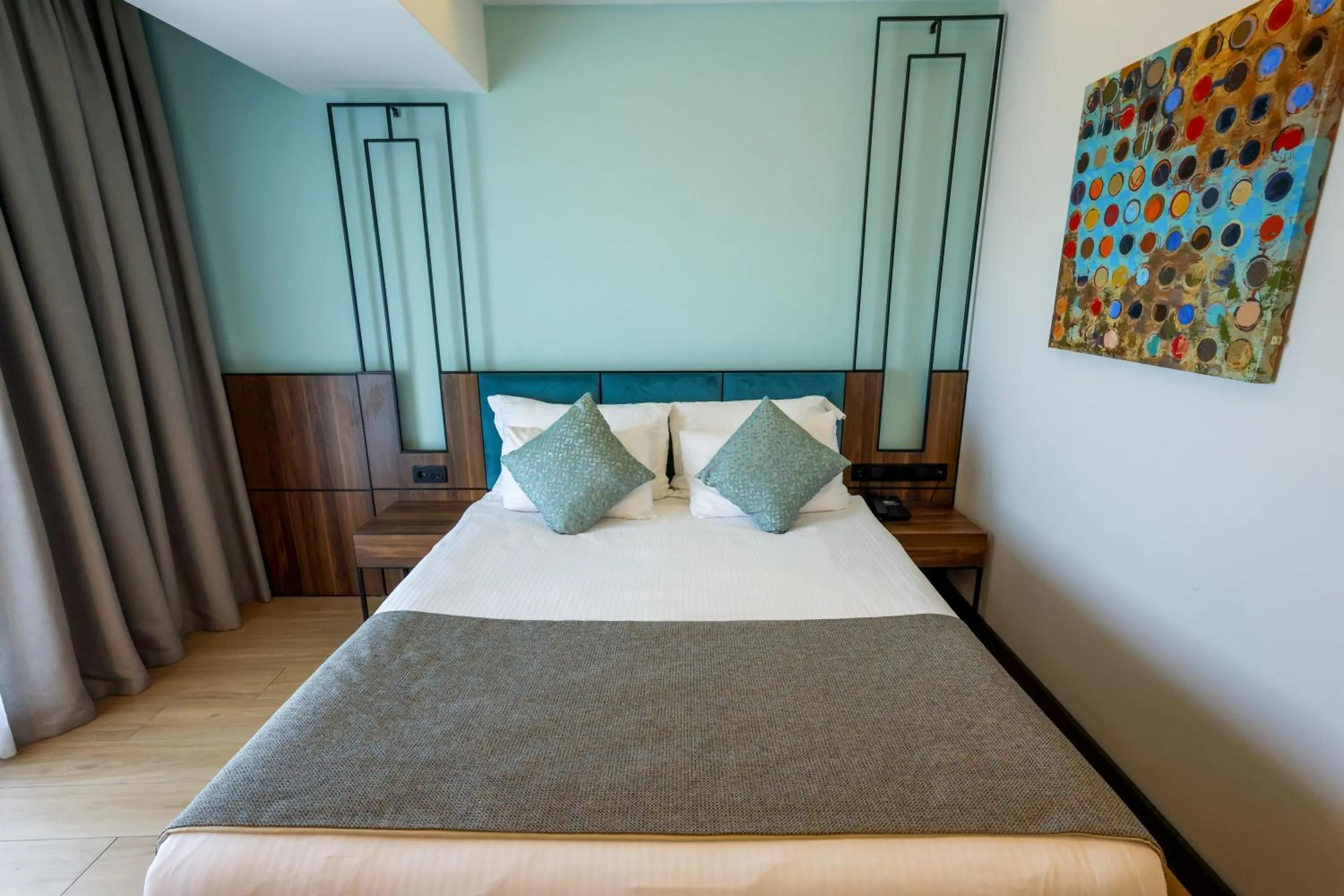 Bed in Leaf Port Hotel