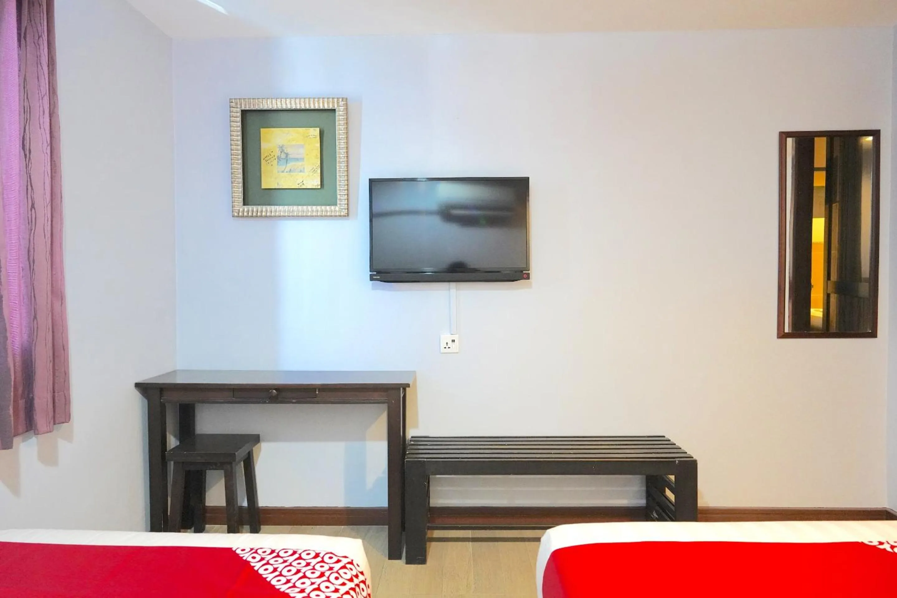 Bedroom in Hotel O Utama Inn