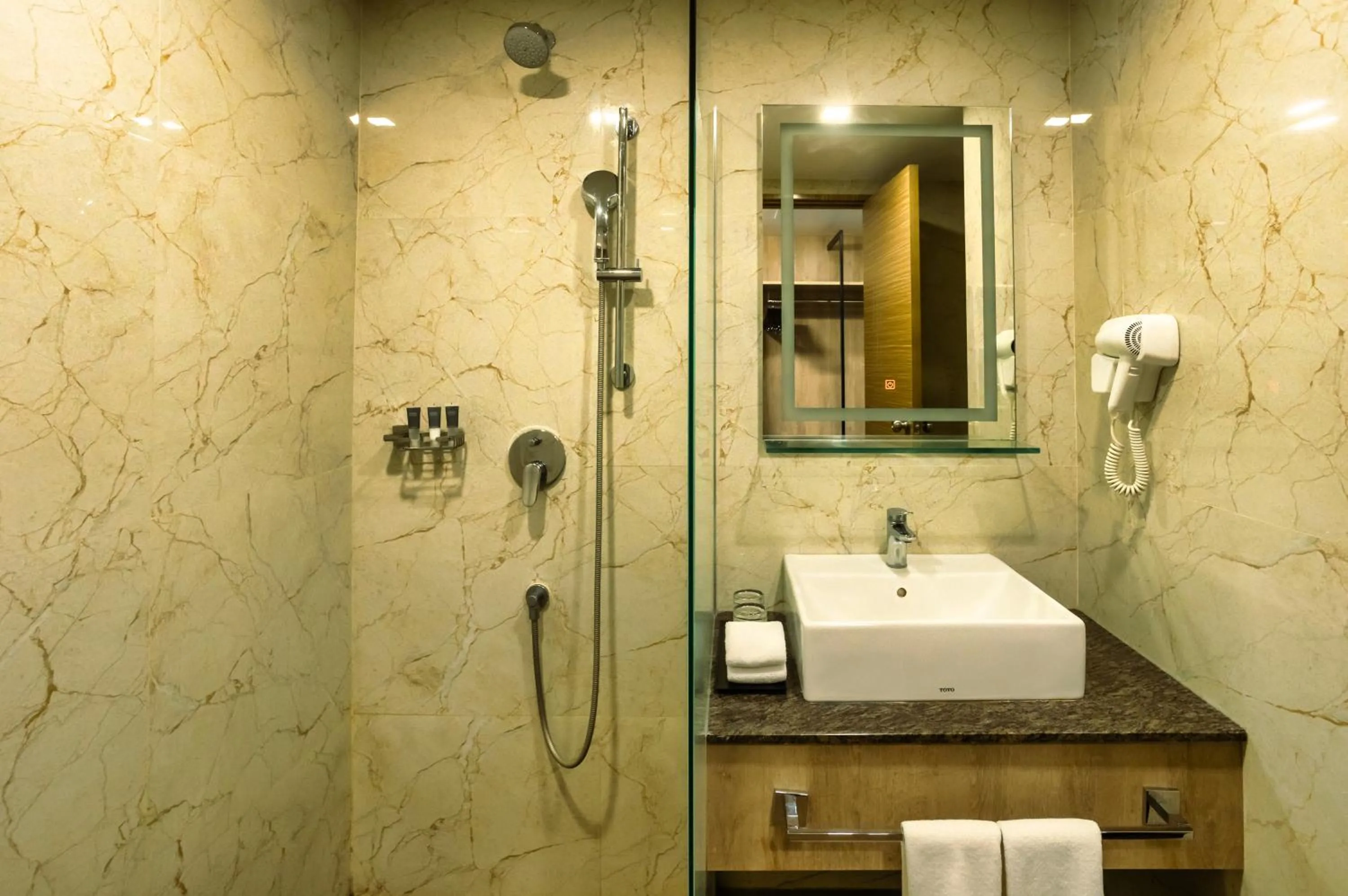 Bathroom in Amika Hotel,Madurai - Near Airport