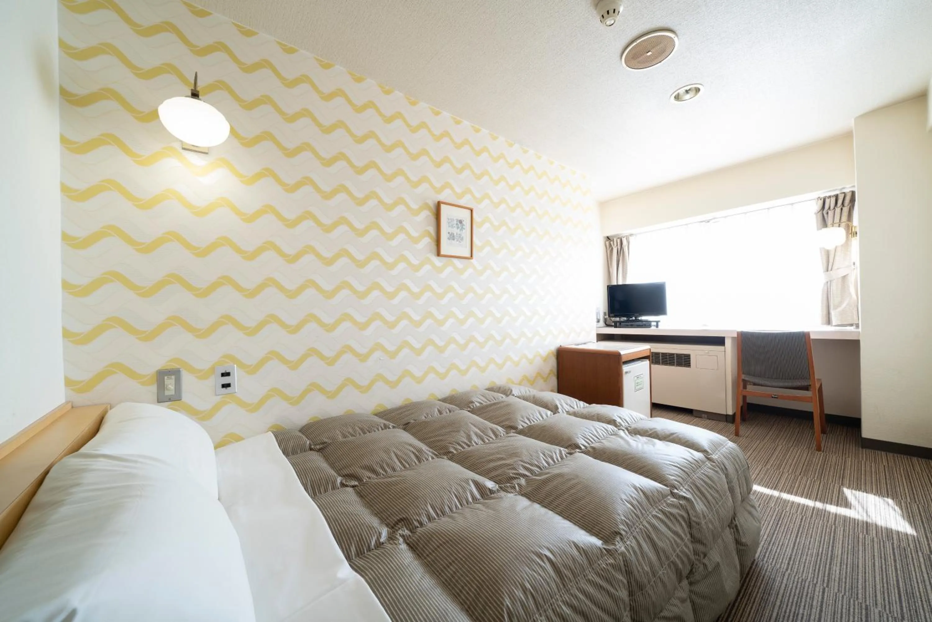 Photo of the whole room, Bed in Hotel Econo Higashi Kanazawa