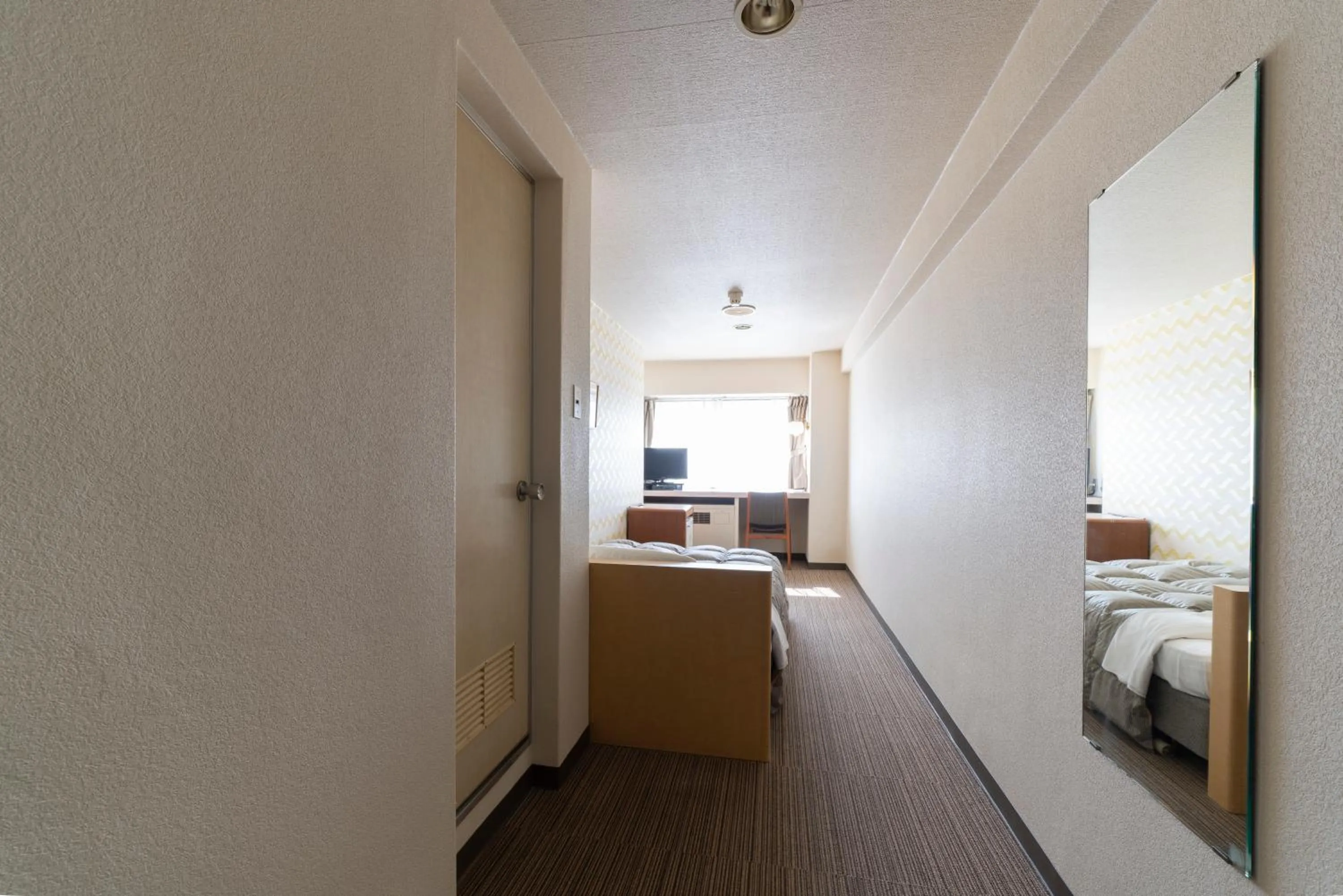 Photo of the whole room, Bed in Hotel Econo Higashi Kanazawa