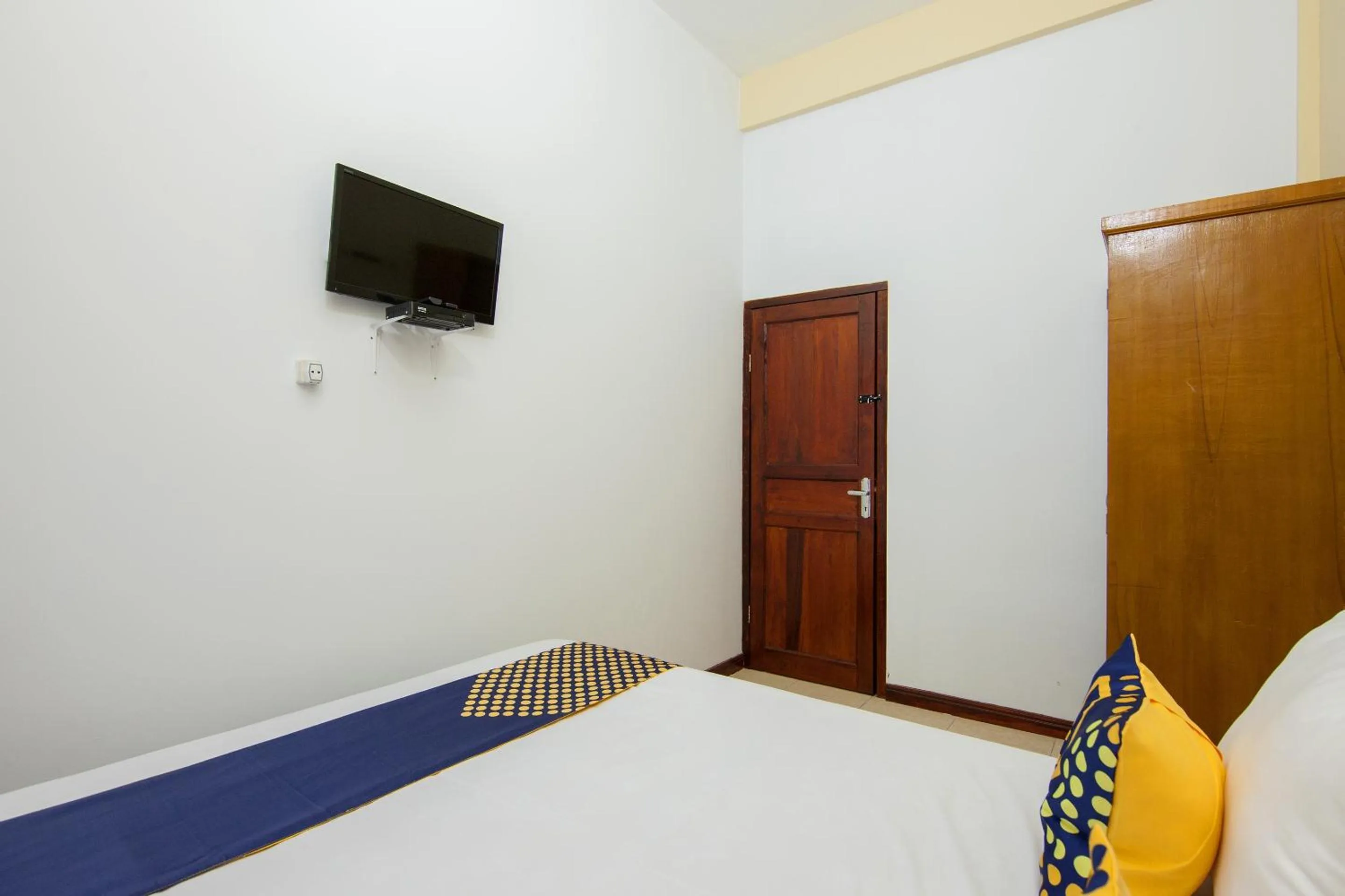 Bedroom, Bed in SPOT ON 2076 Hotel Stadion