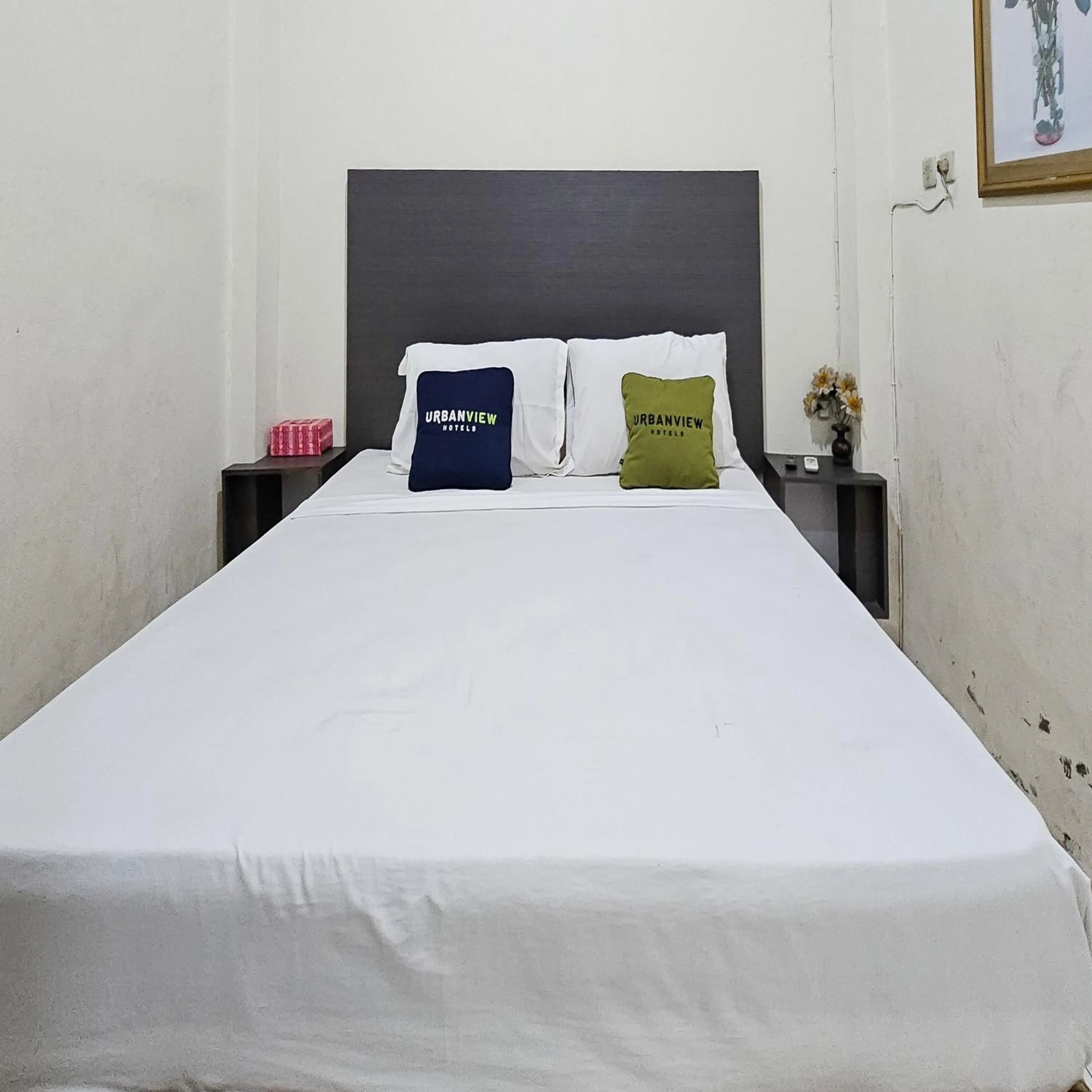 Bedroom, Bed in Urbanview Hotel Kharisma Banjarmasin