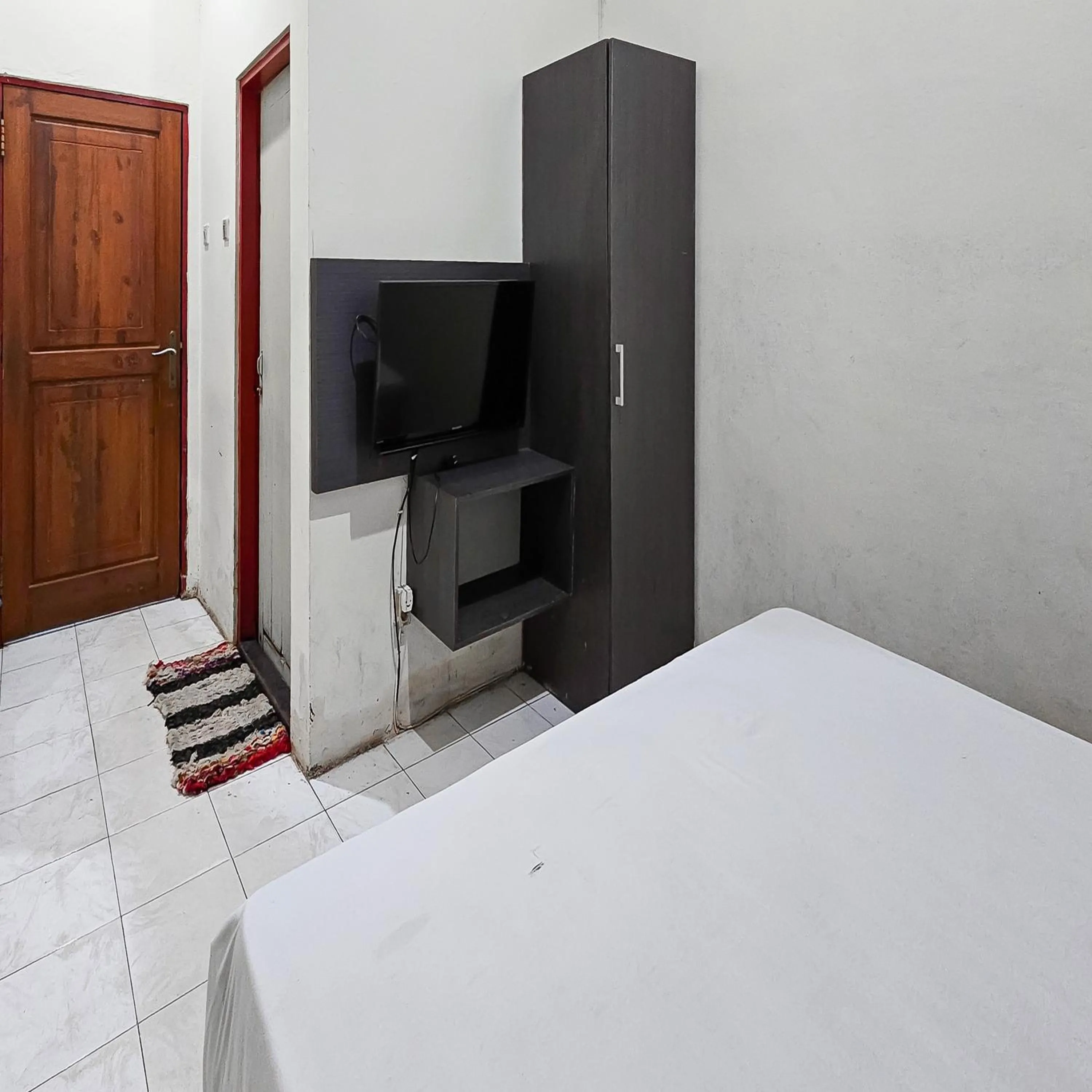 Bedroom, Bed in Urbanview Hotel Kharisma Banjarmasin