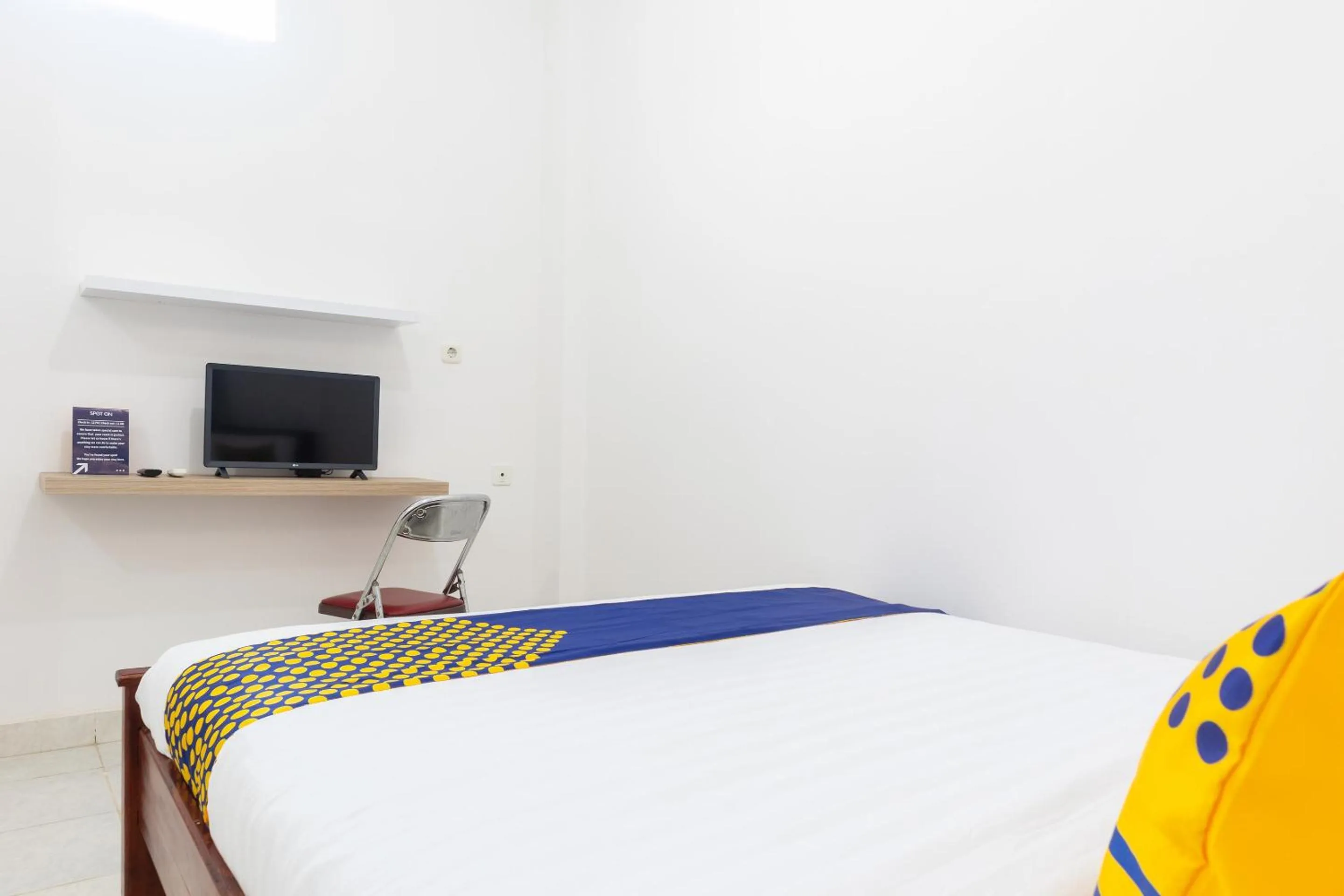 Bedroom in SPOT ON 2063 Bethania Residence