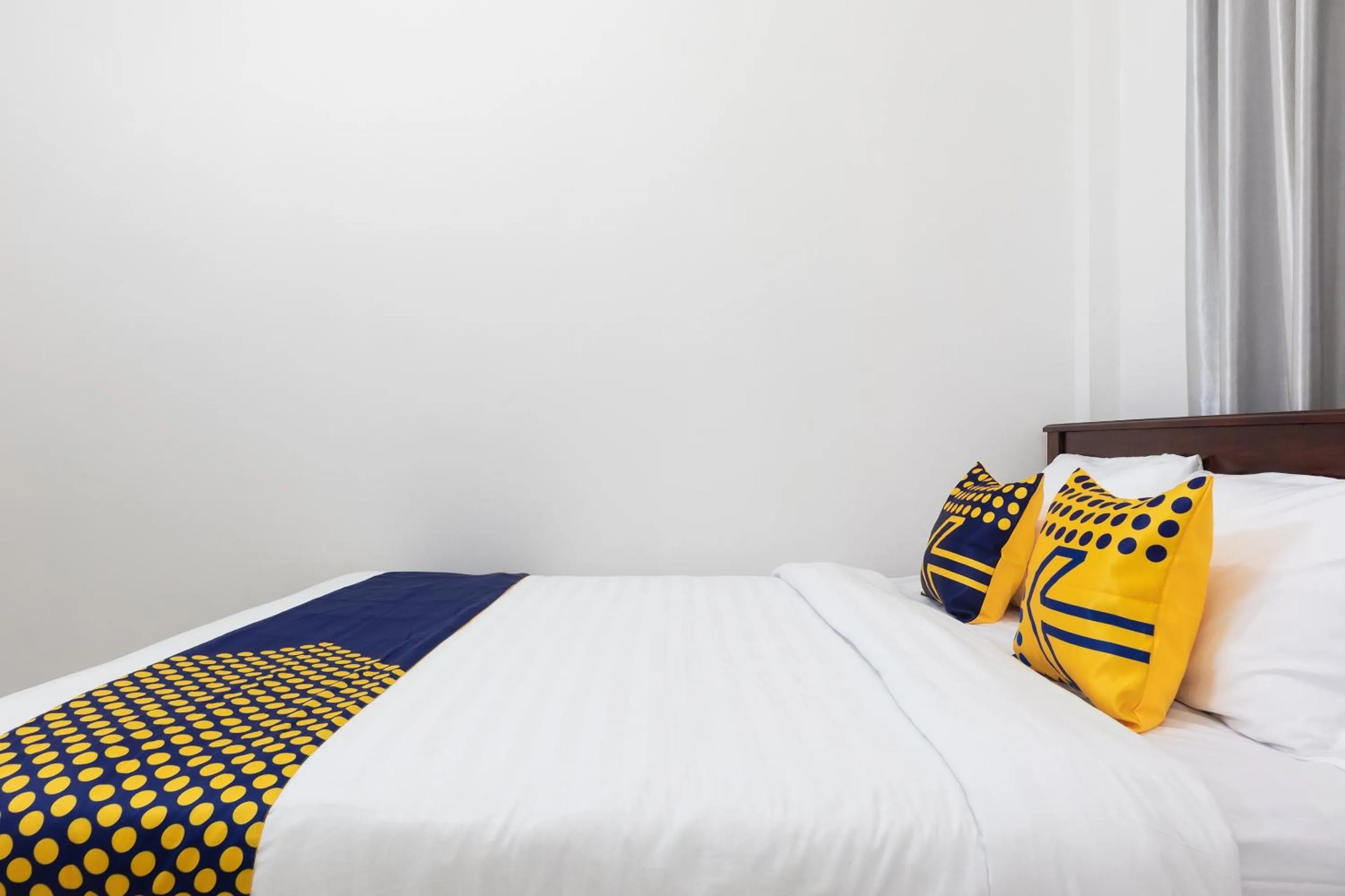 Bedroom in SPOT ON 2063 Bethania Residence