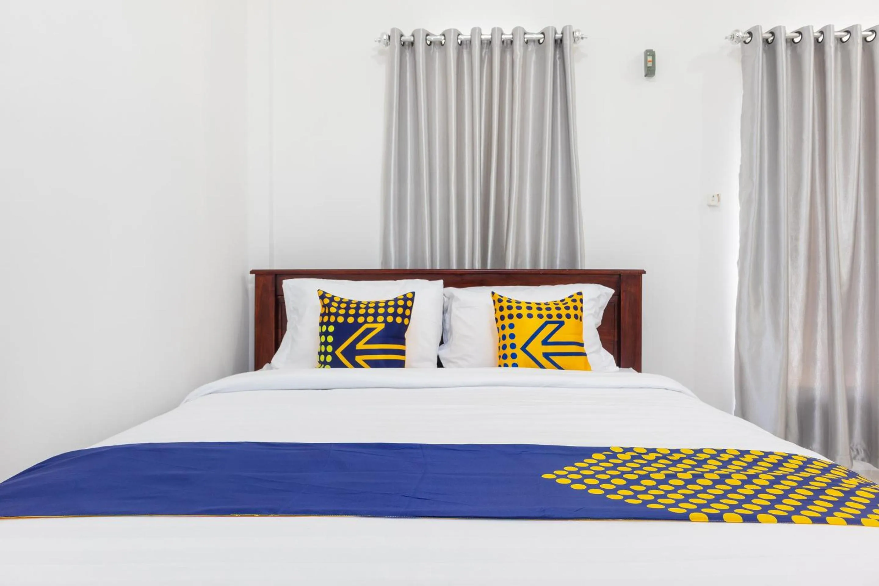 Bedroom in SPOT ON 2063 Bethania Residence