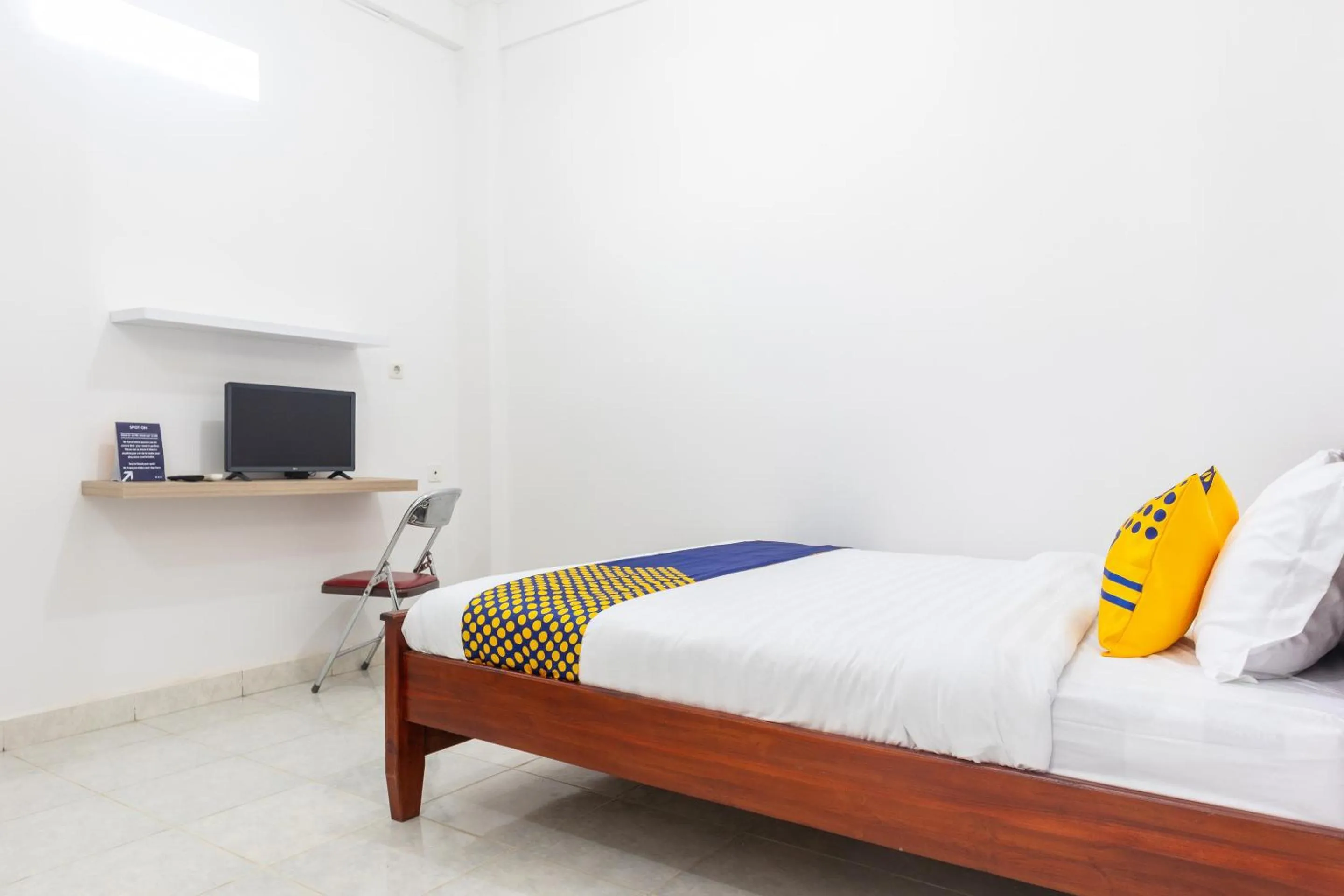 Bedroom in SPOT ON 2063 Bethania Residence