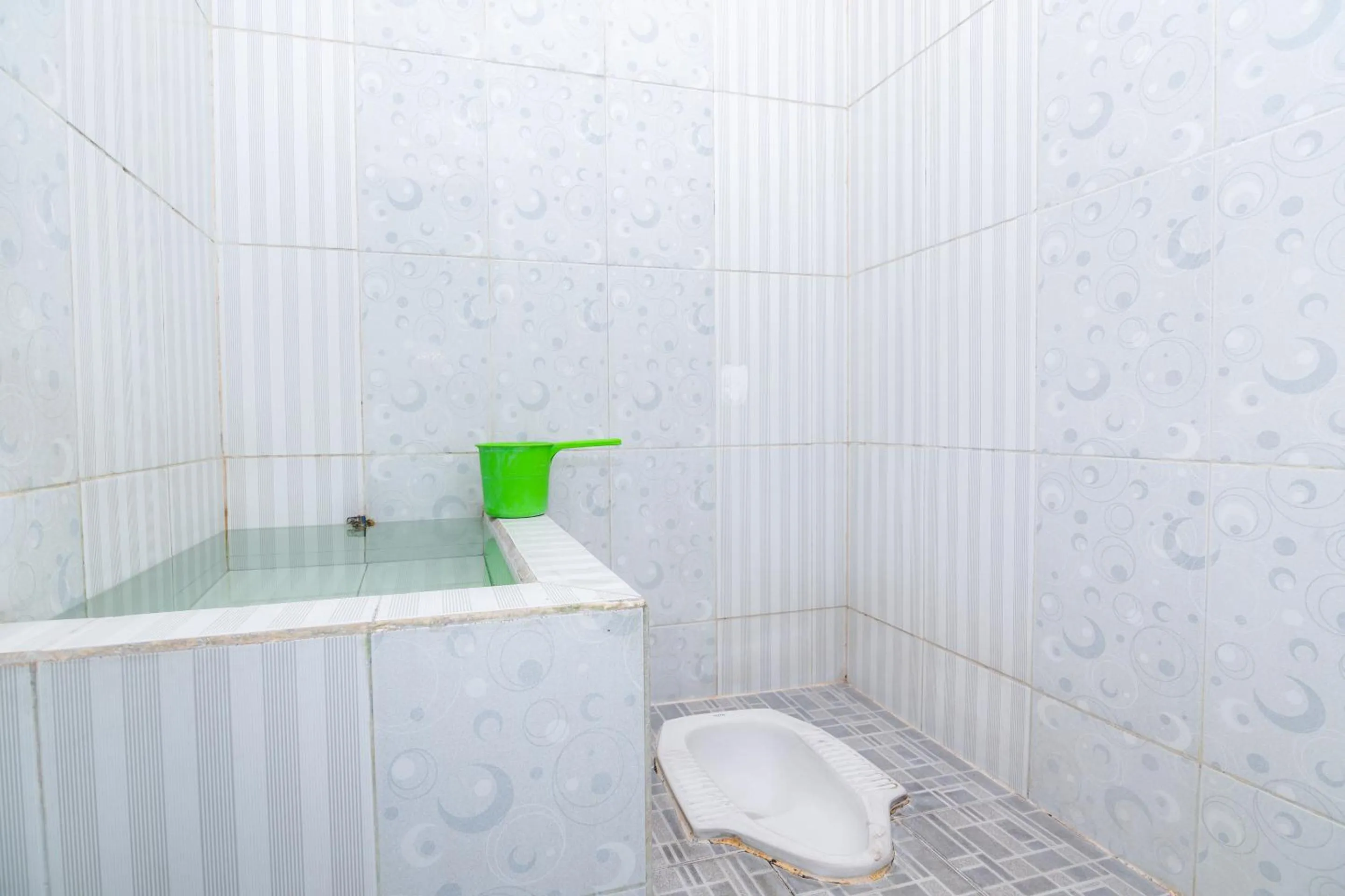 Bathroom in OYO 1956 Kana Family Residence