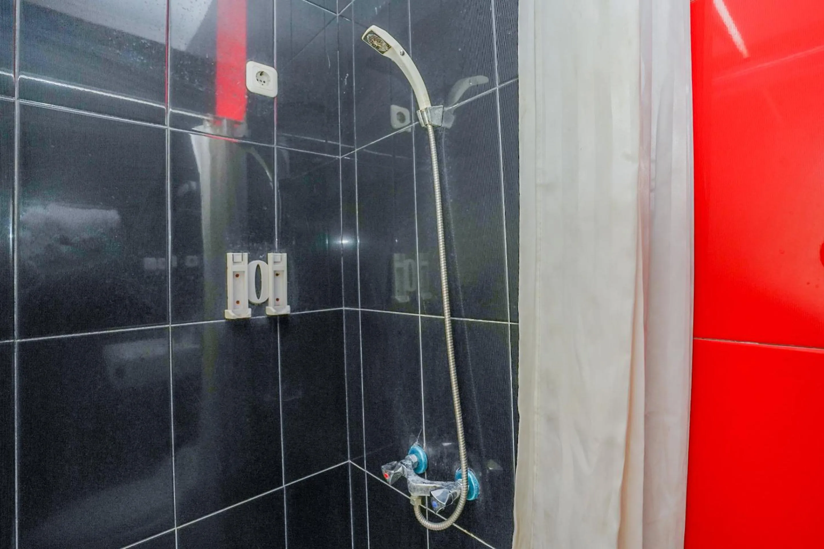 Bathroom in OYO 1956 Kana Family Residence