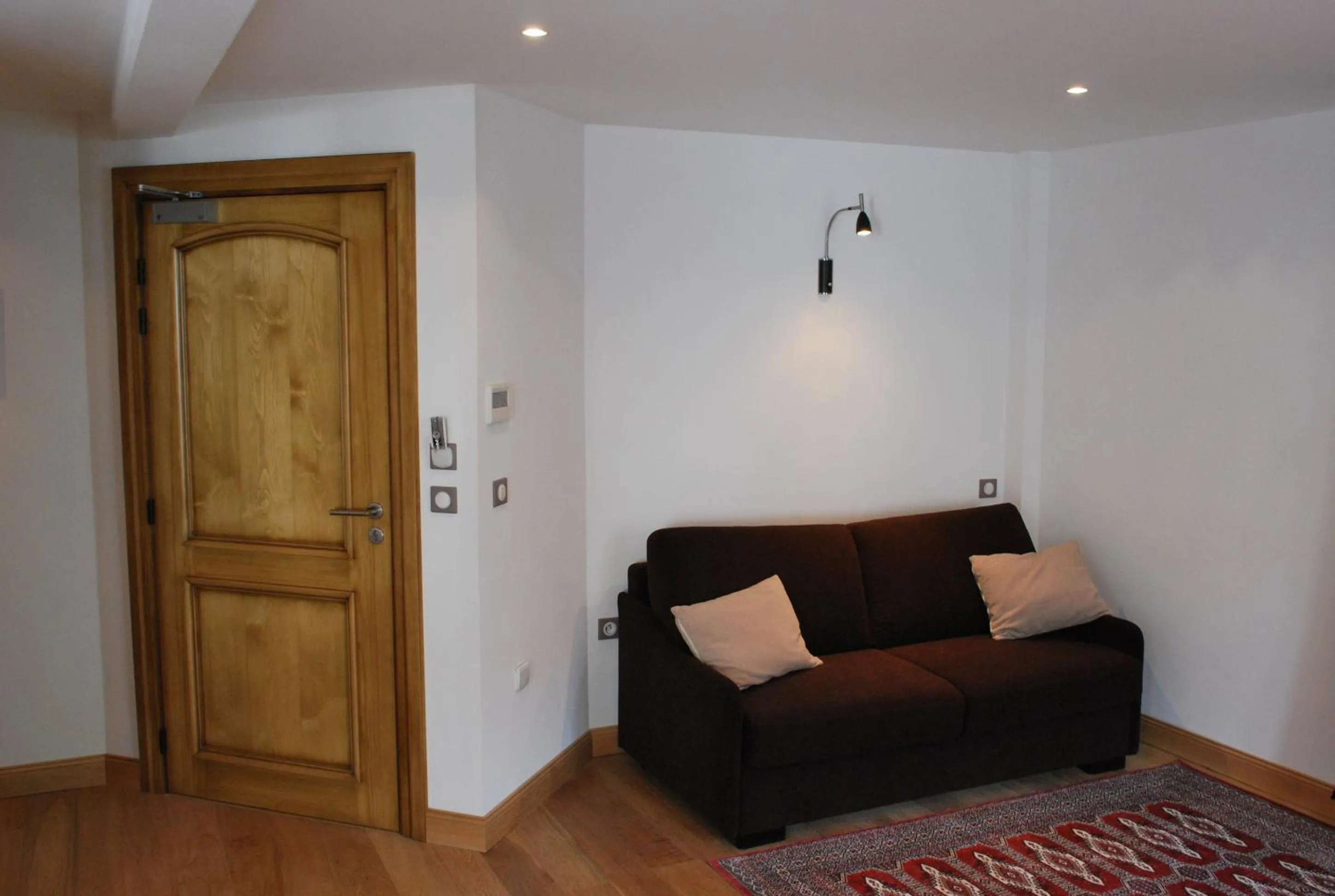 Seating area in Logis Hôtel Restaurant Kleiber