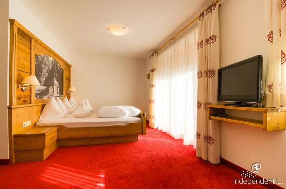 Bedroom, Bed in Hotel Pfandleralm