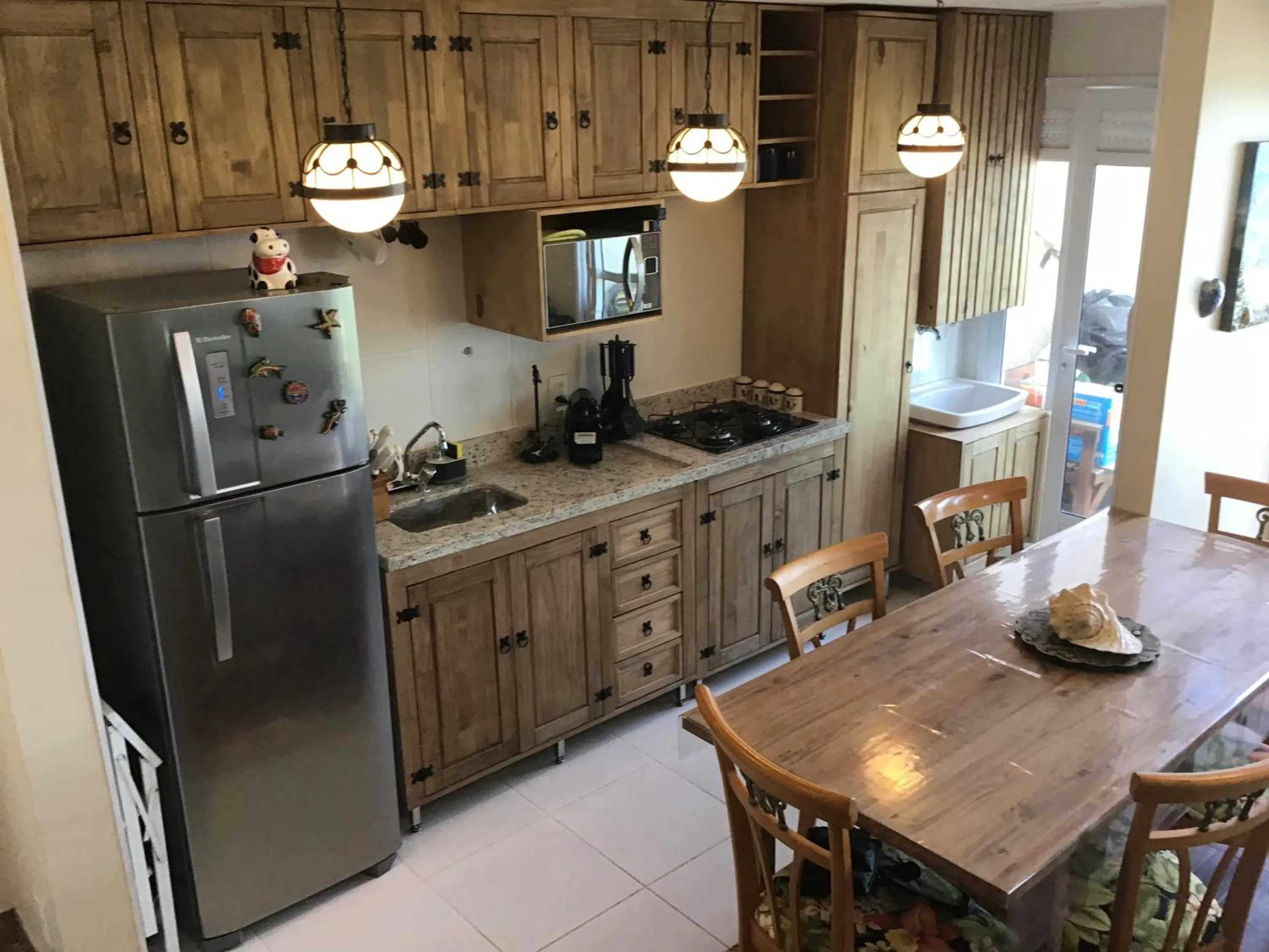 Kitchen or kitchenette in Duplex charmoso