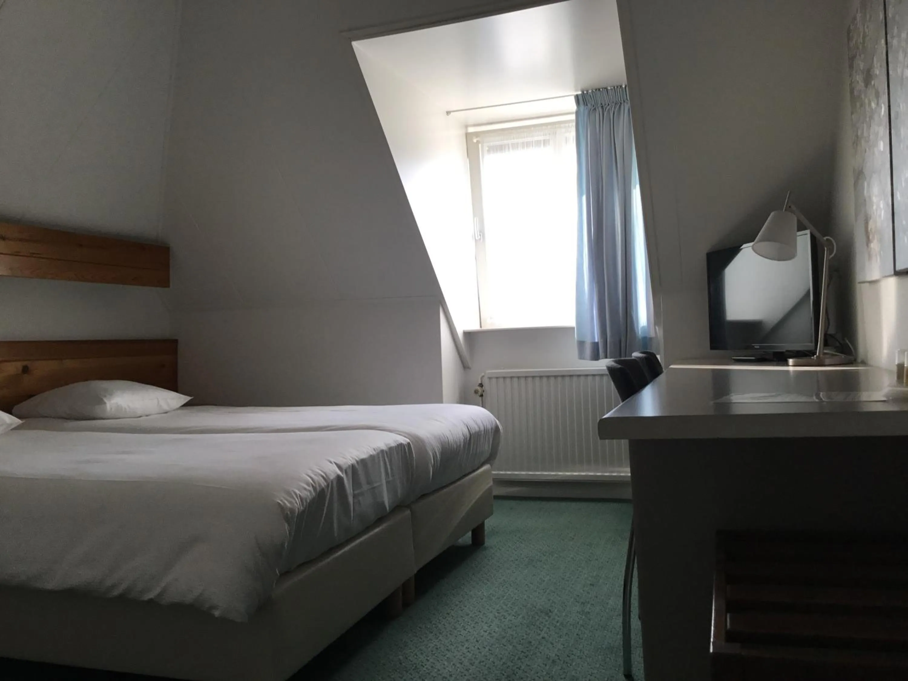 Bed in Hotel Steensel