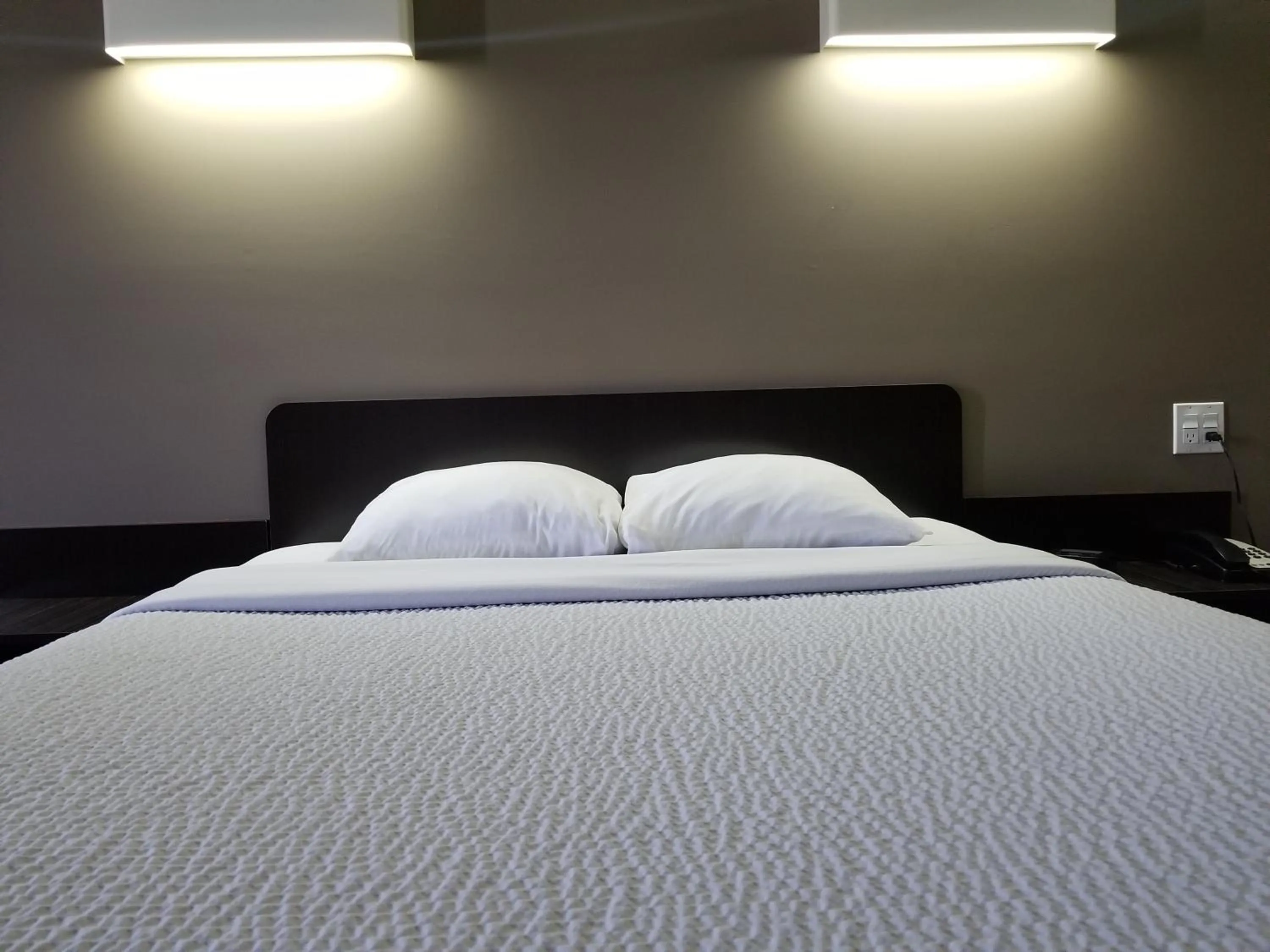 Bed in Joys Inn Innisfail, AB