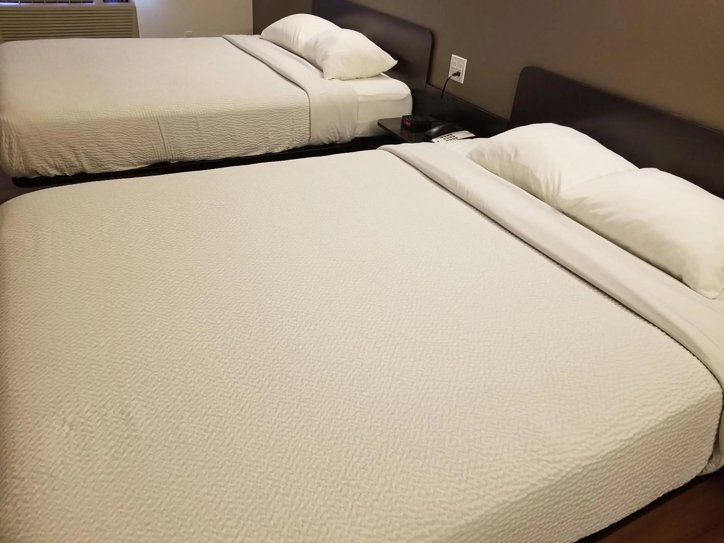 Bed in Joys Inn Innisfail, AB