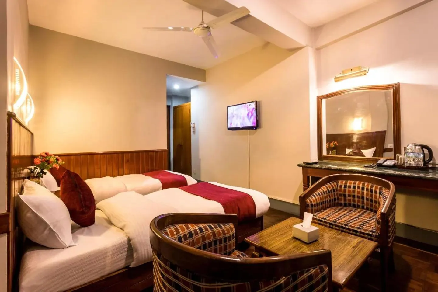 Bed in Mystic Homes Hotel