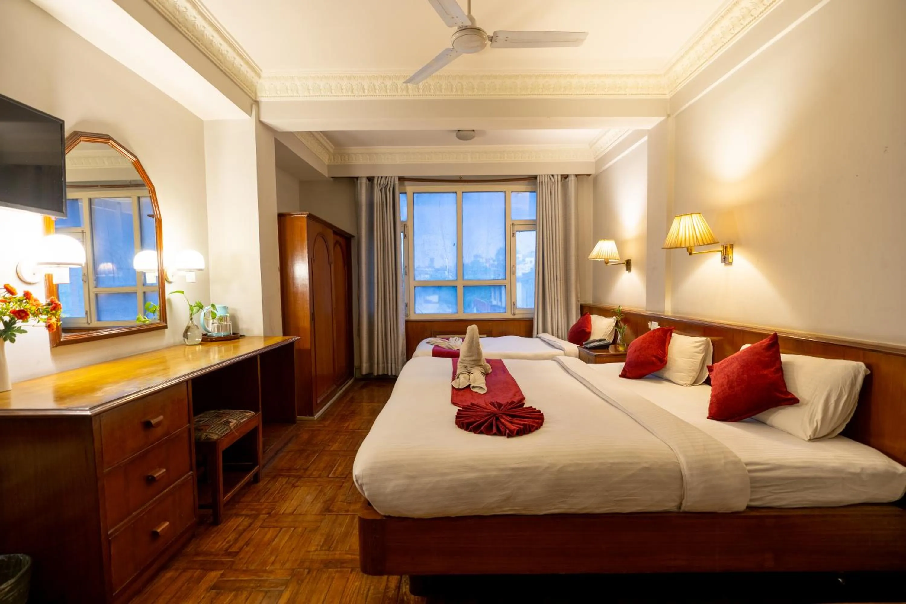 Bed in Mystic Homes Hotel