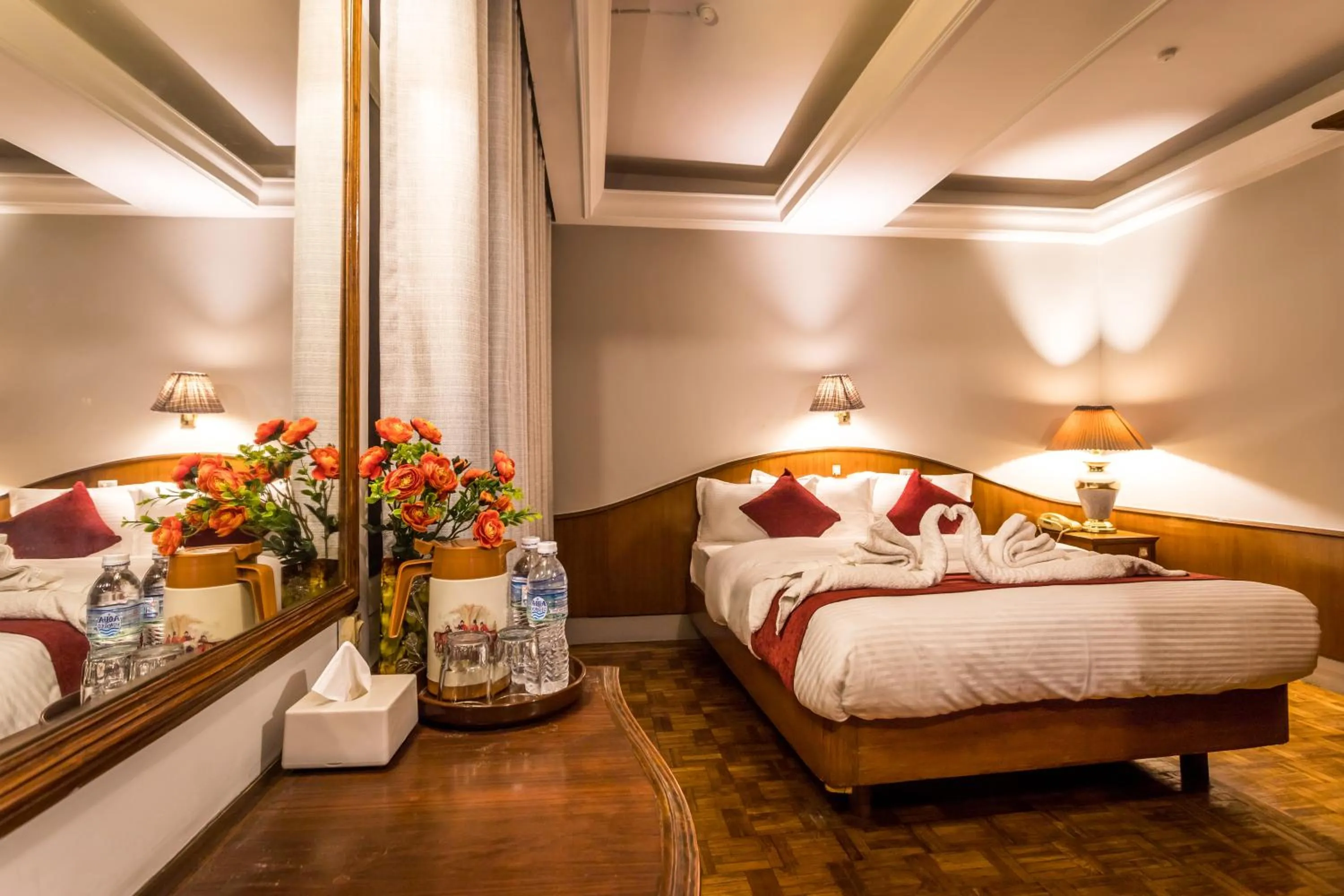 Bed in Mystic Homes Hotel