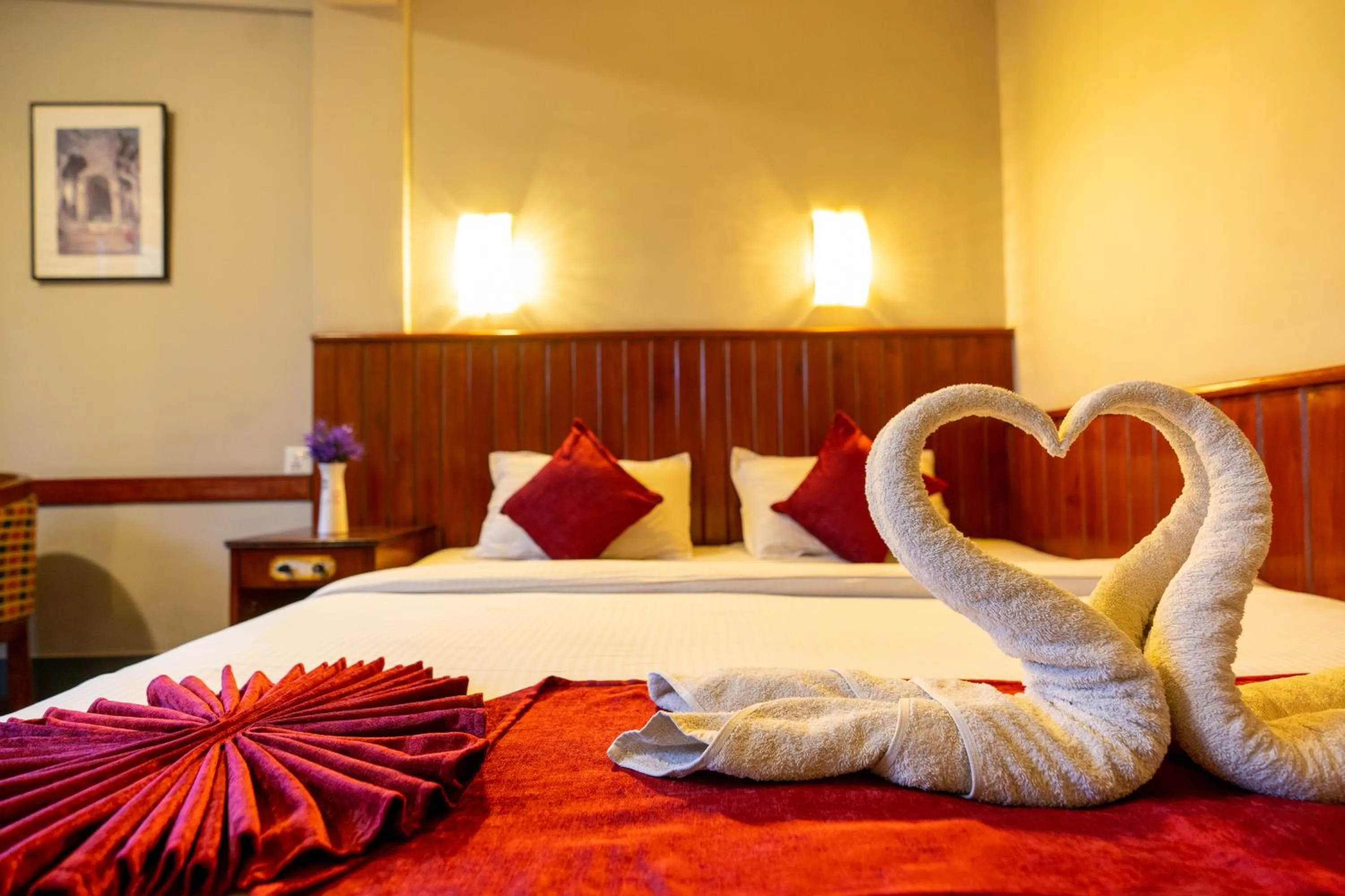 Bed in Mystic Homes Hotel