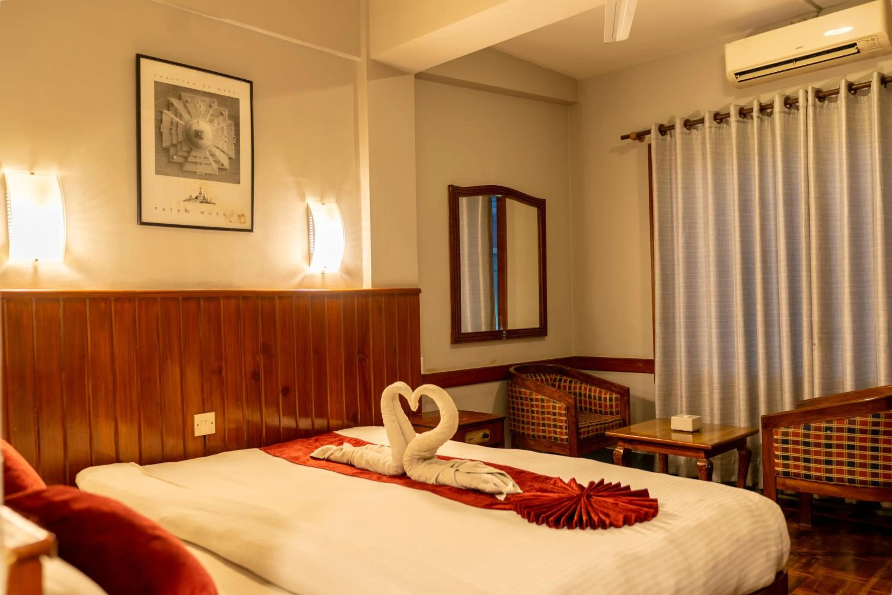 Bed in Mystic Homes Hotel