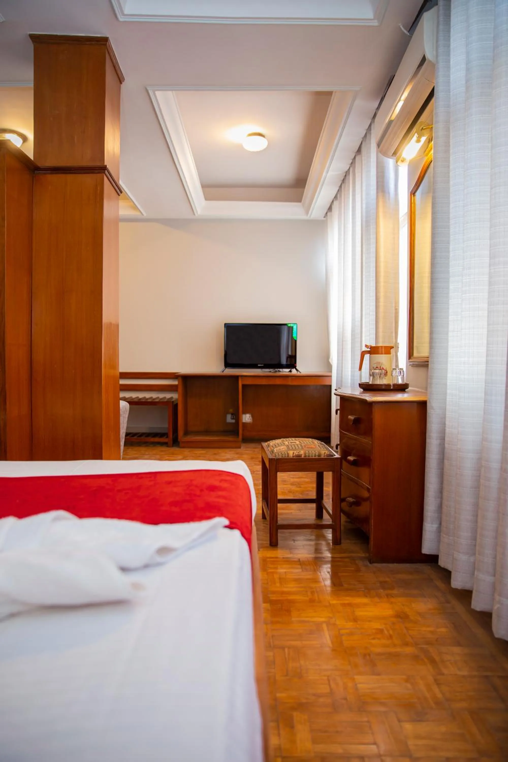 Communal lounge/ TV room in Mystic Homes Hotel