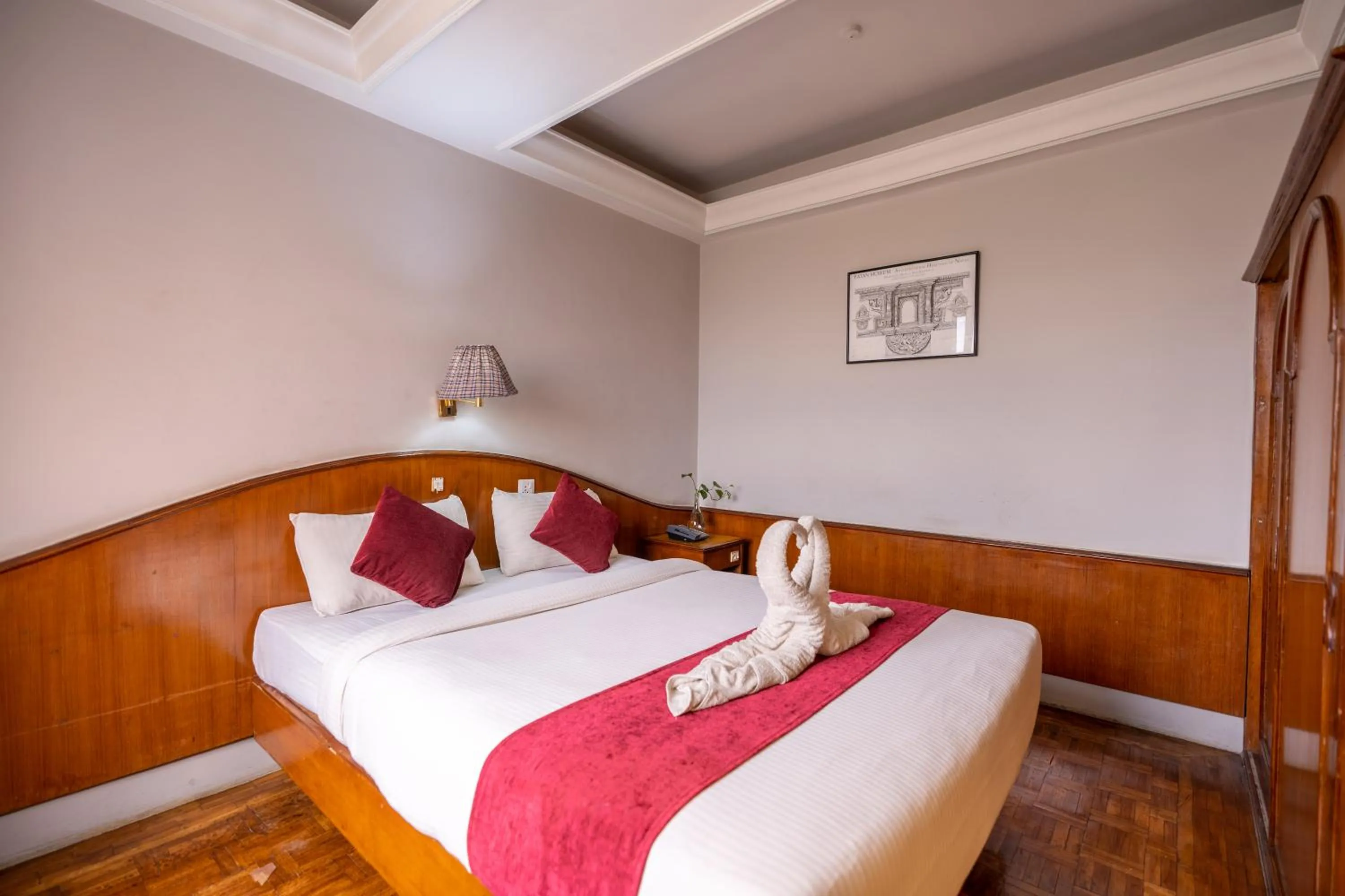 Bed in Mystic Homes Hotel