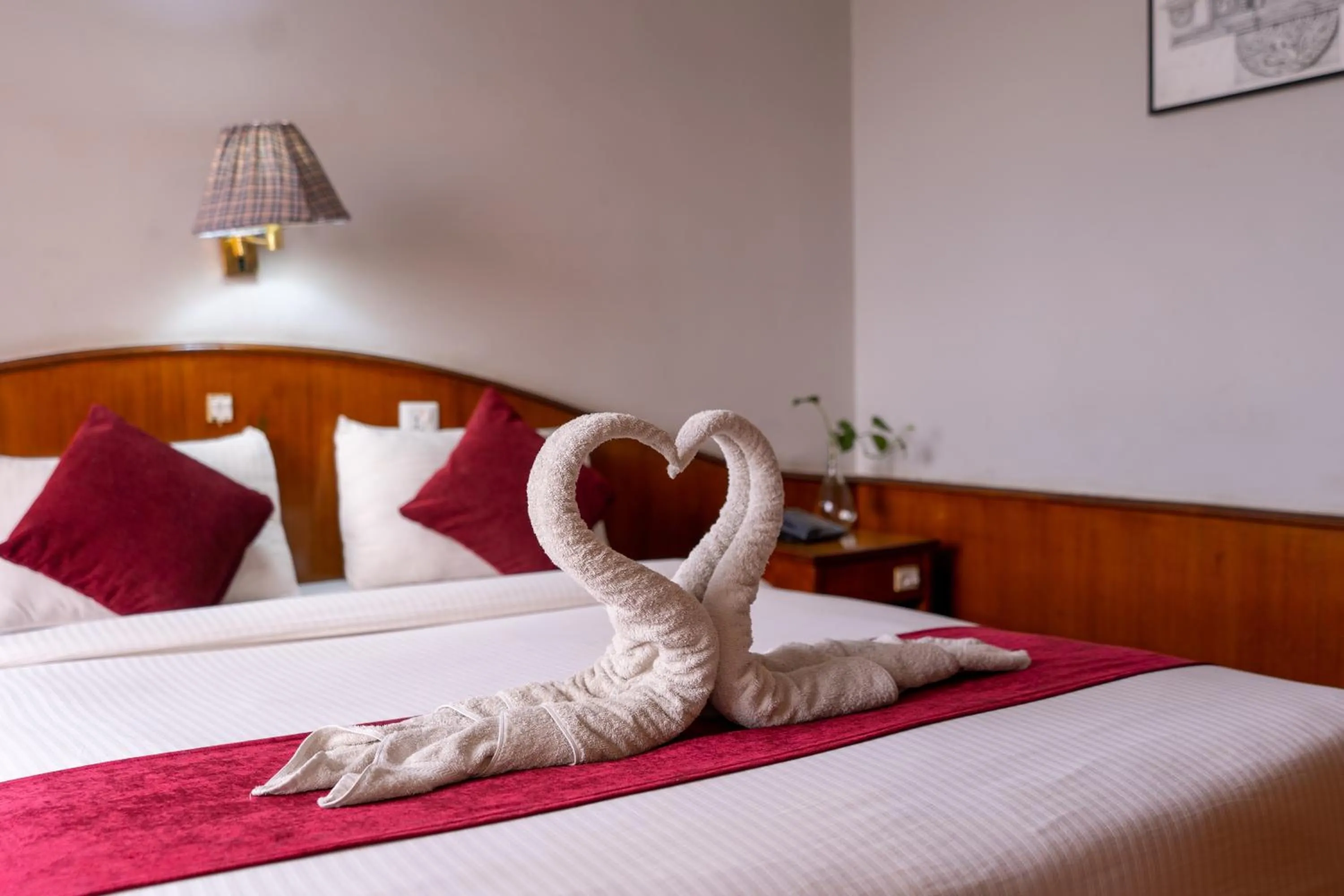 Bed in Mystic Homes Hotel