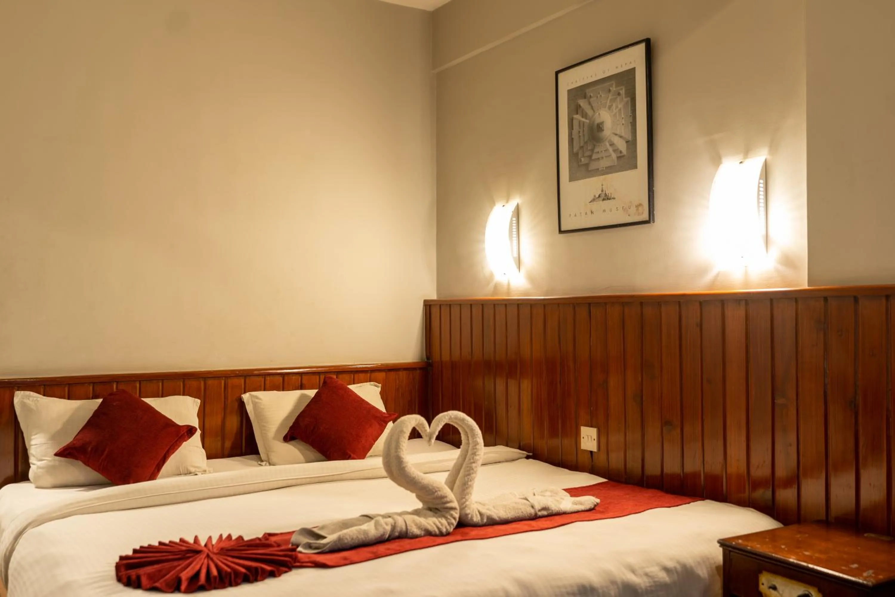 Bed in Mystic Homes Hotel