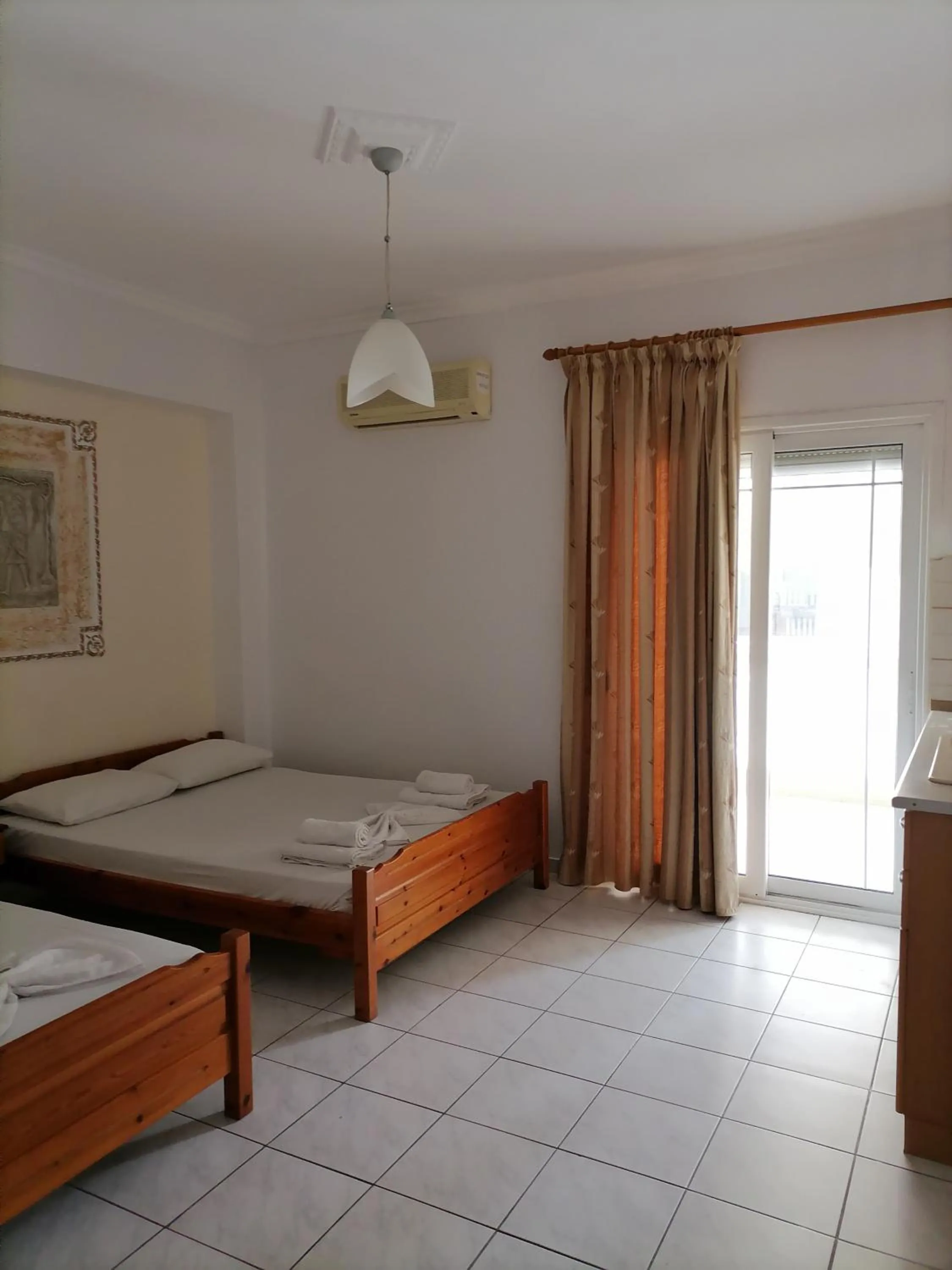 Bed in Hotel Exarhos