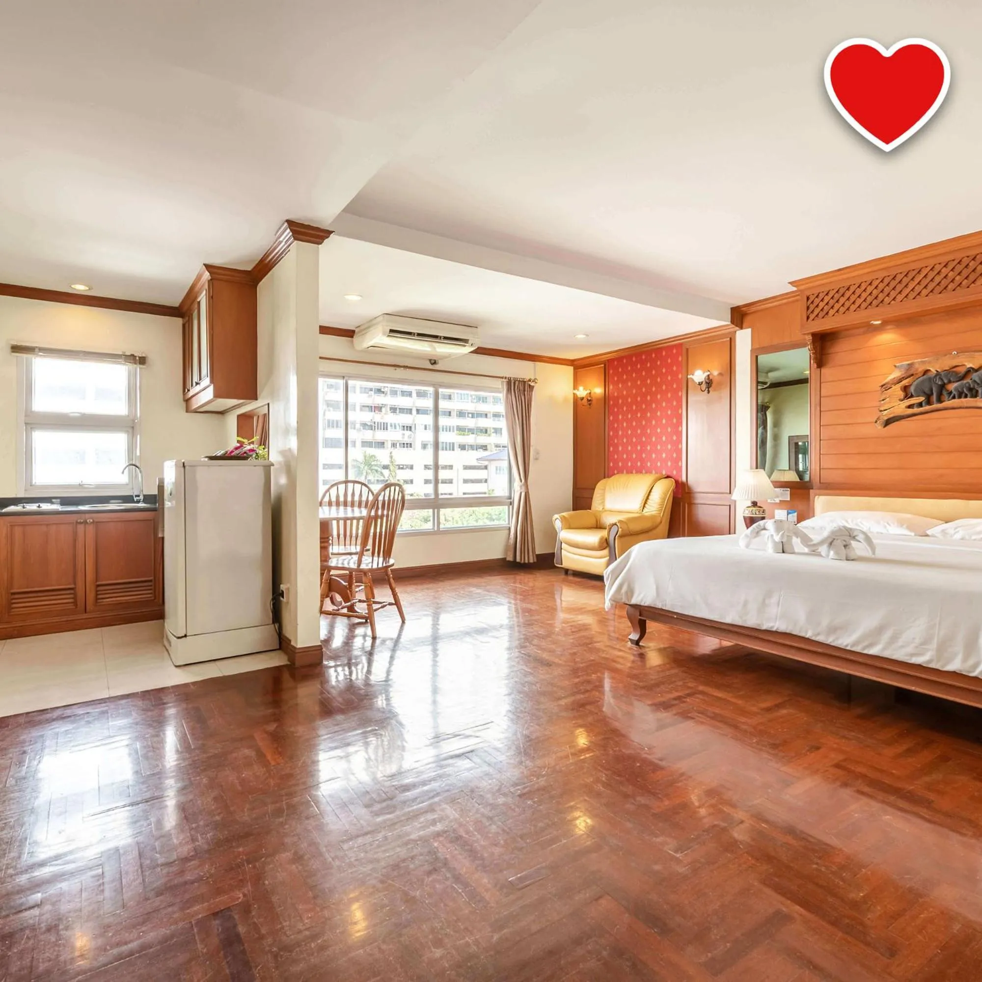 Photo of the whole room, Bed in Studio Suite by Royal Ivory Nana