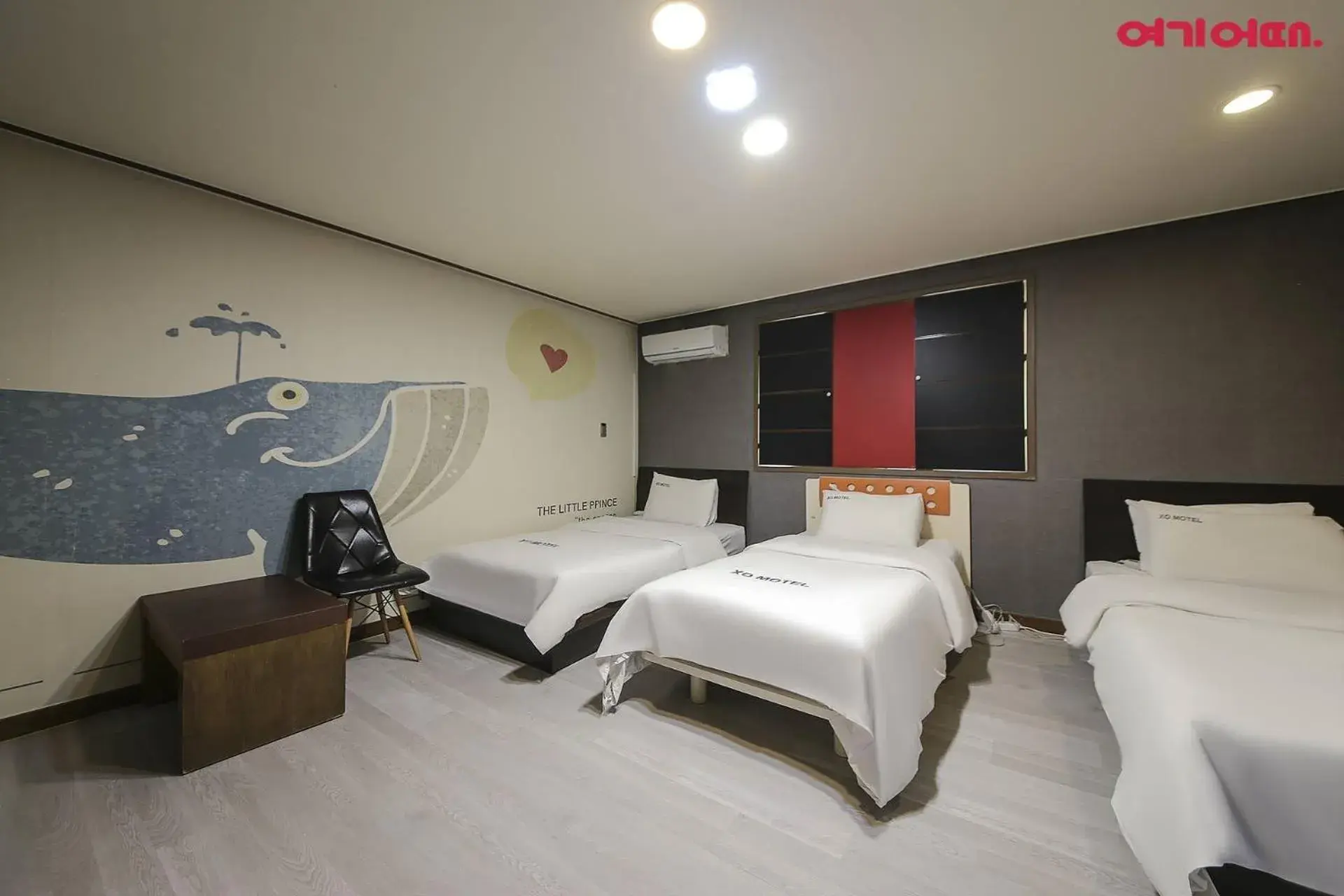 Deluxe Triple Room in XO Hotel Deluxe Triple Room in XO Hotel