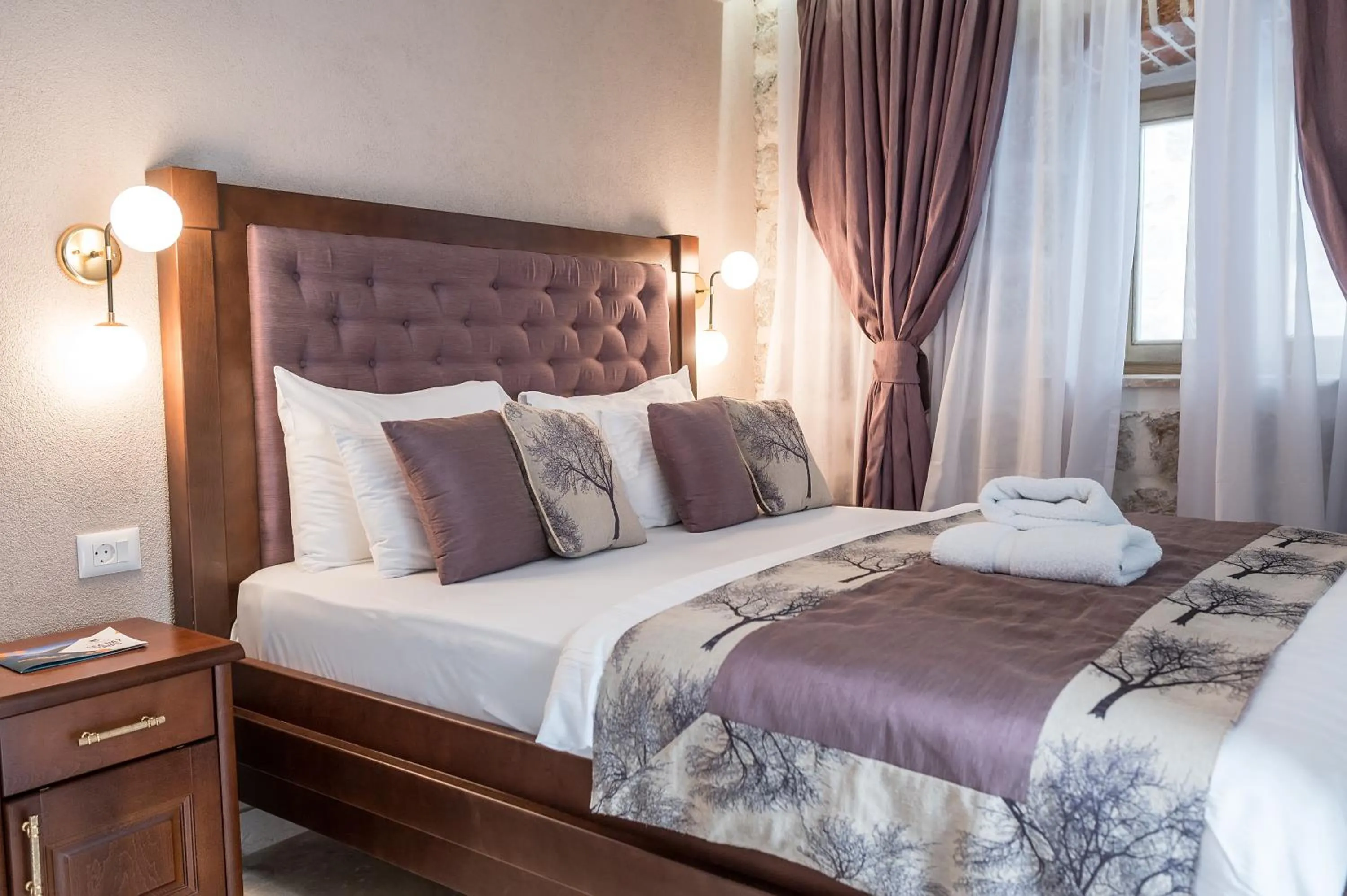 Bed in Conte Hotel & Restaurant