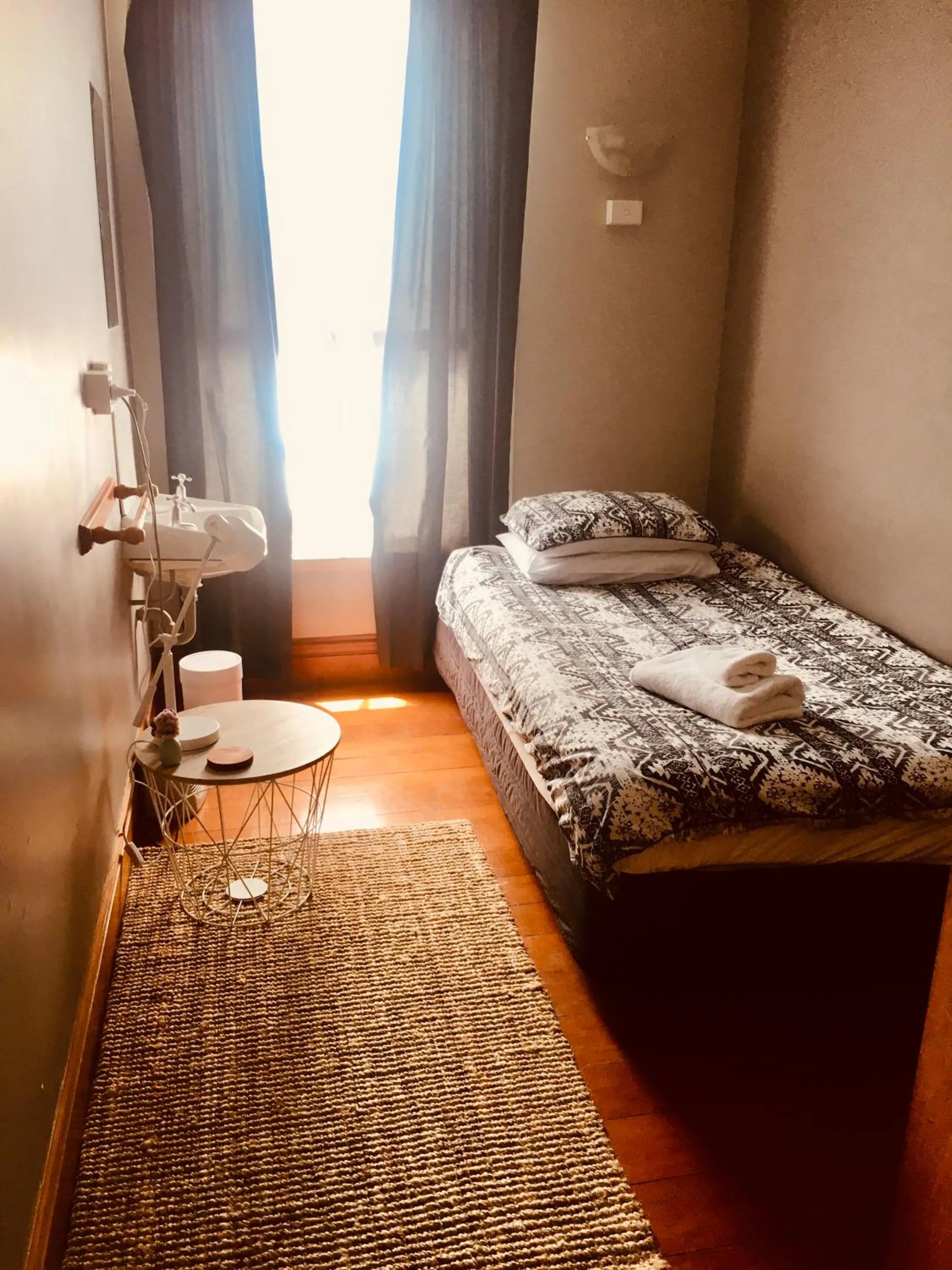 Bed in HarbourView Hotel