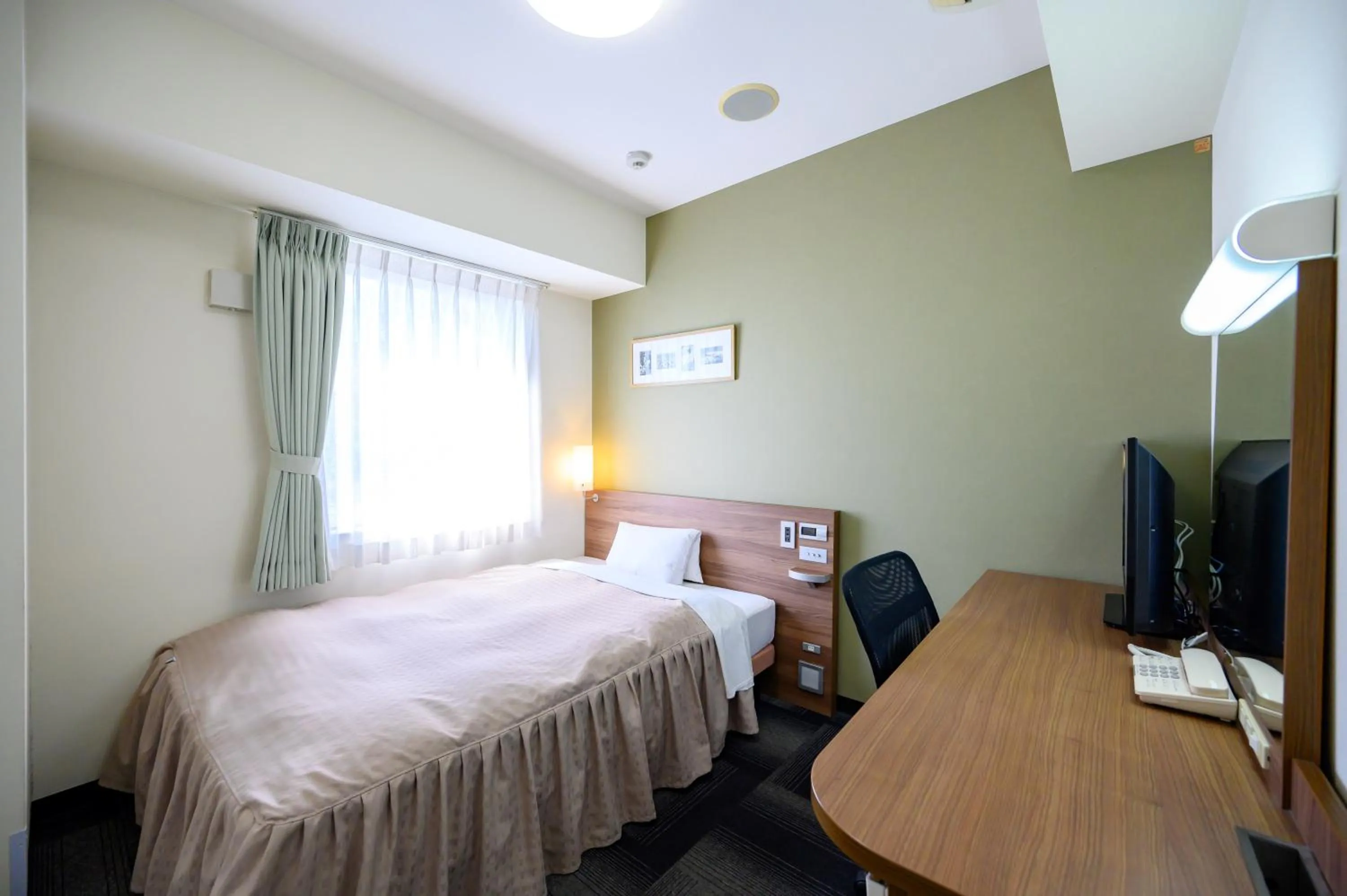 Photo of the whole room, Bed in Hotel Econo Kameyama